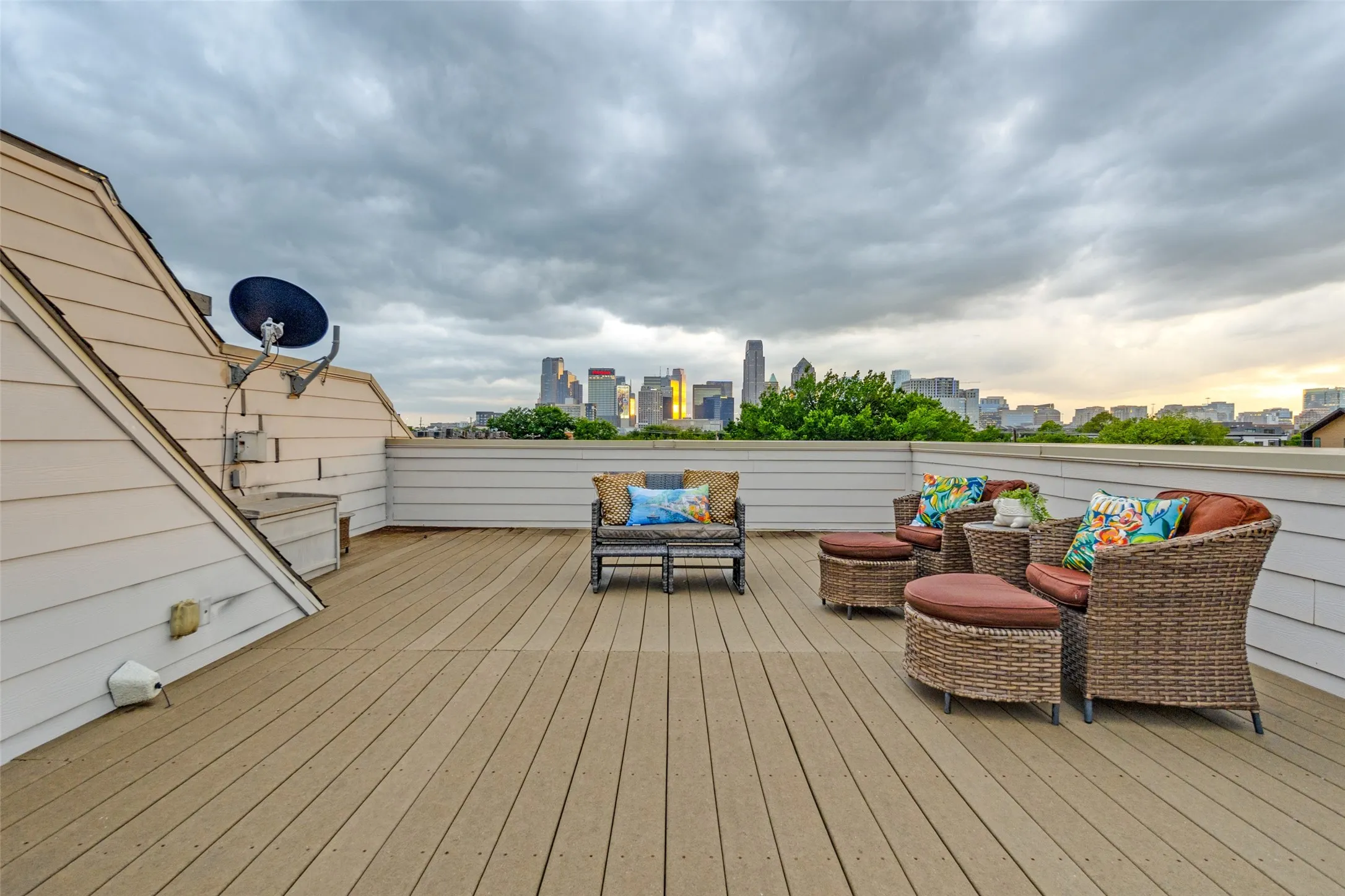 Beautiful rooftop deck with sweeping views of downtown perfect for an evening cocktail or morning yoga