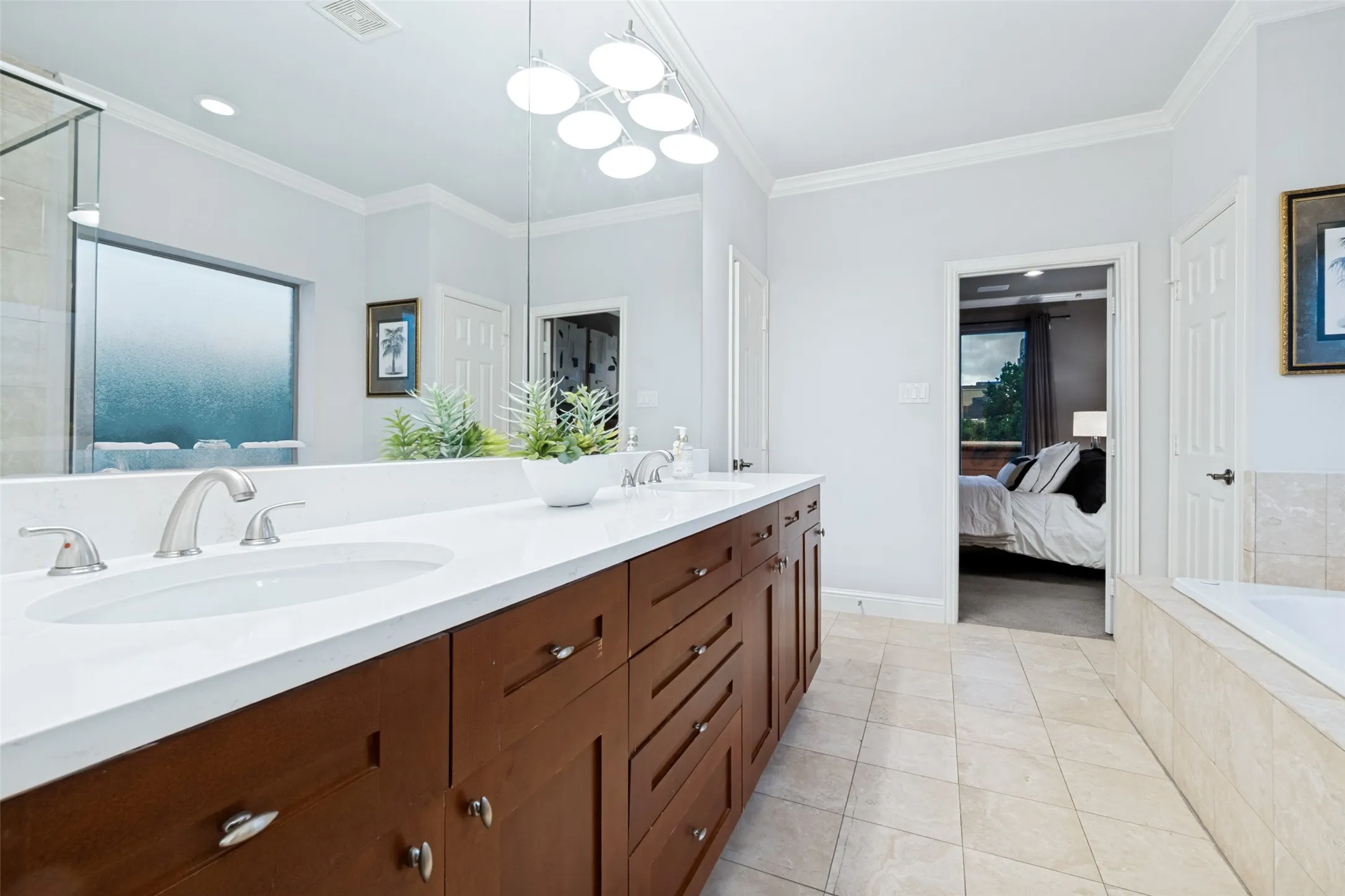 Primary bath with double sinks, new countertops and fixtures