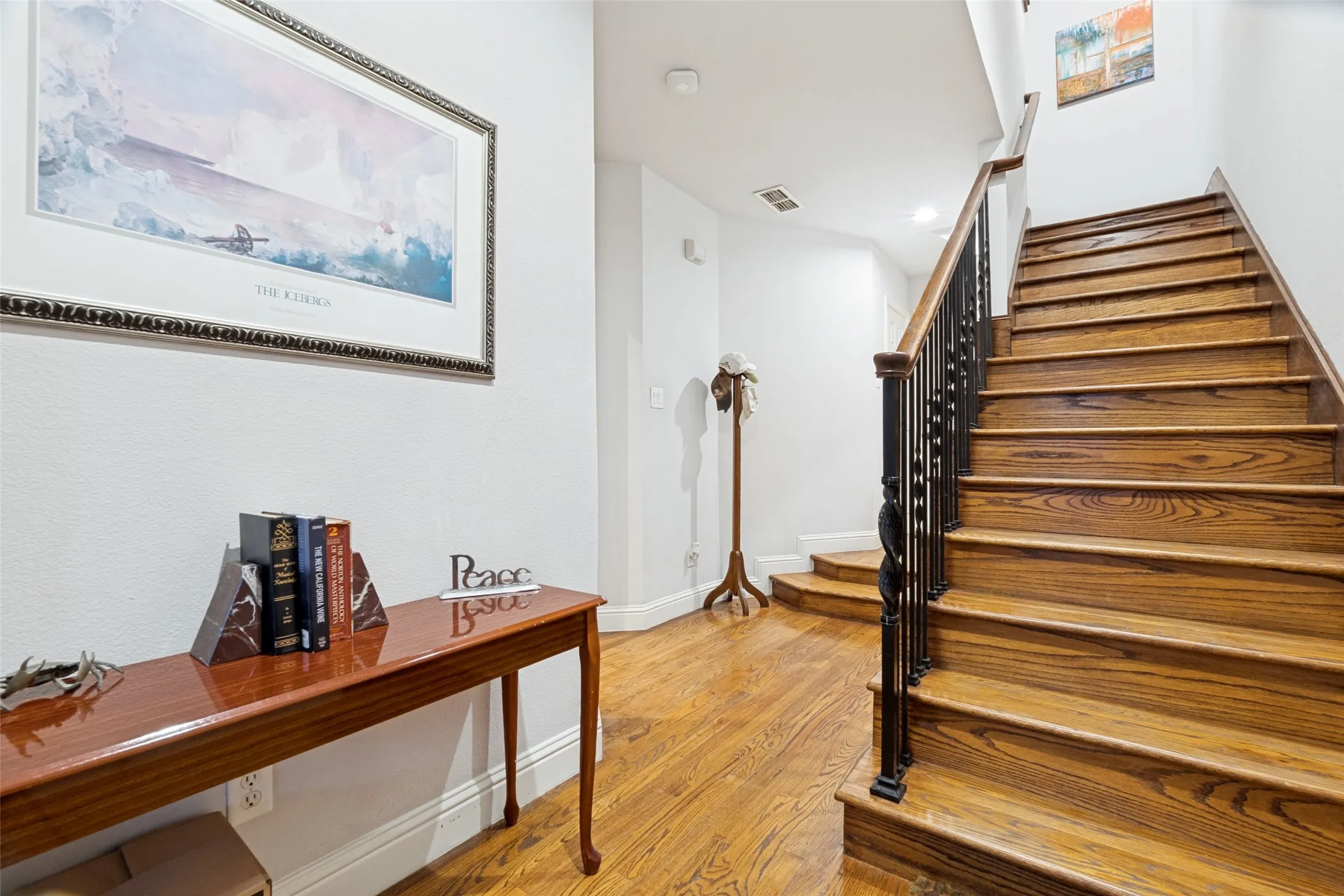 Foyer with beautiful hardwood floors