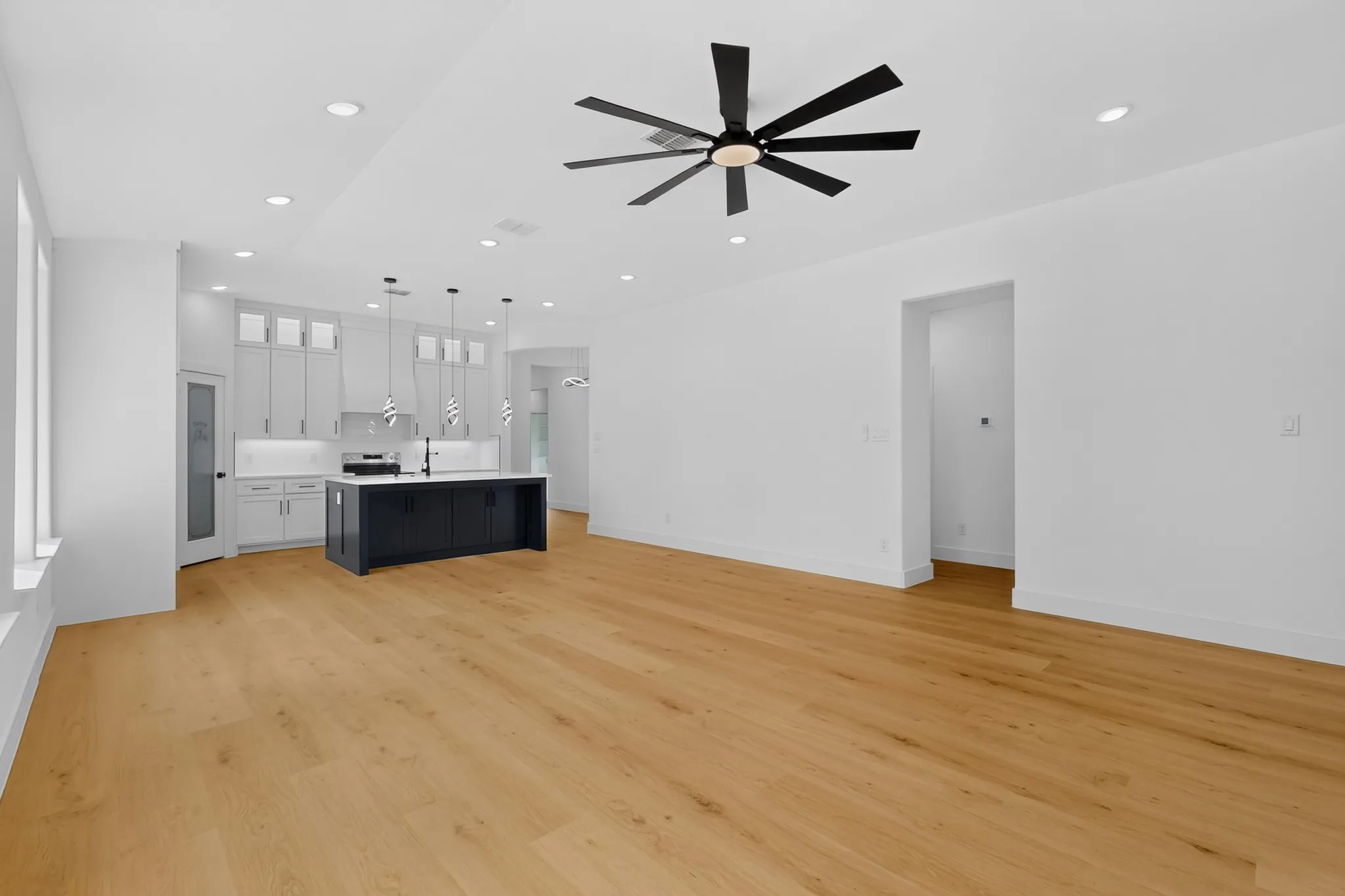 Open living area with laminate flooring