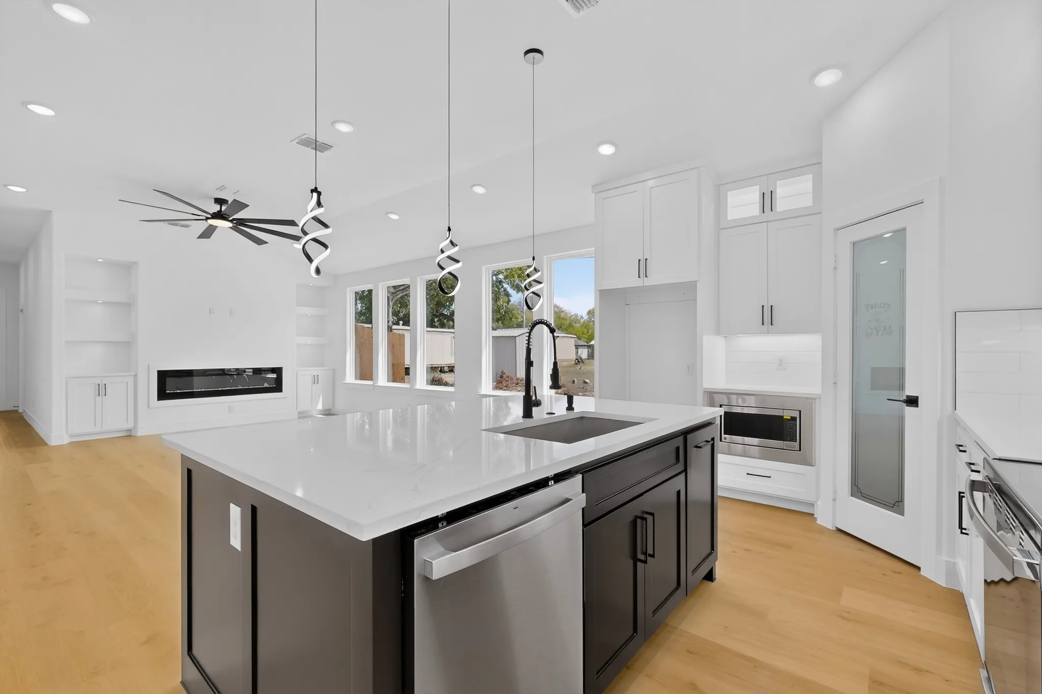 Open kitchen with large island and plenty of counter space