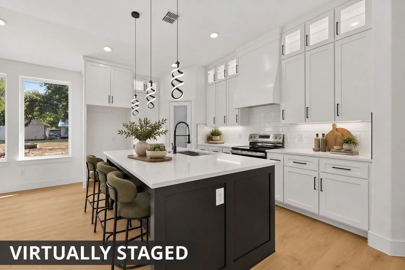 Featuring a large center island and abundant cabinetry