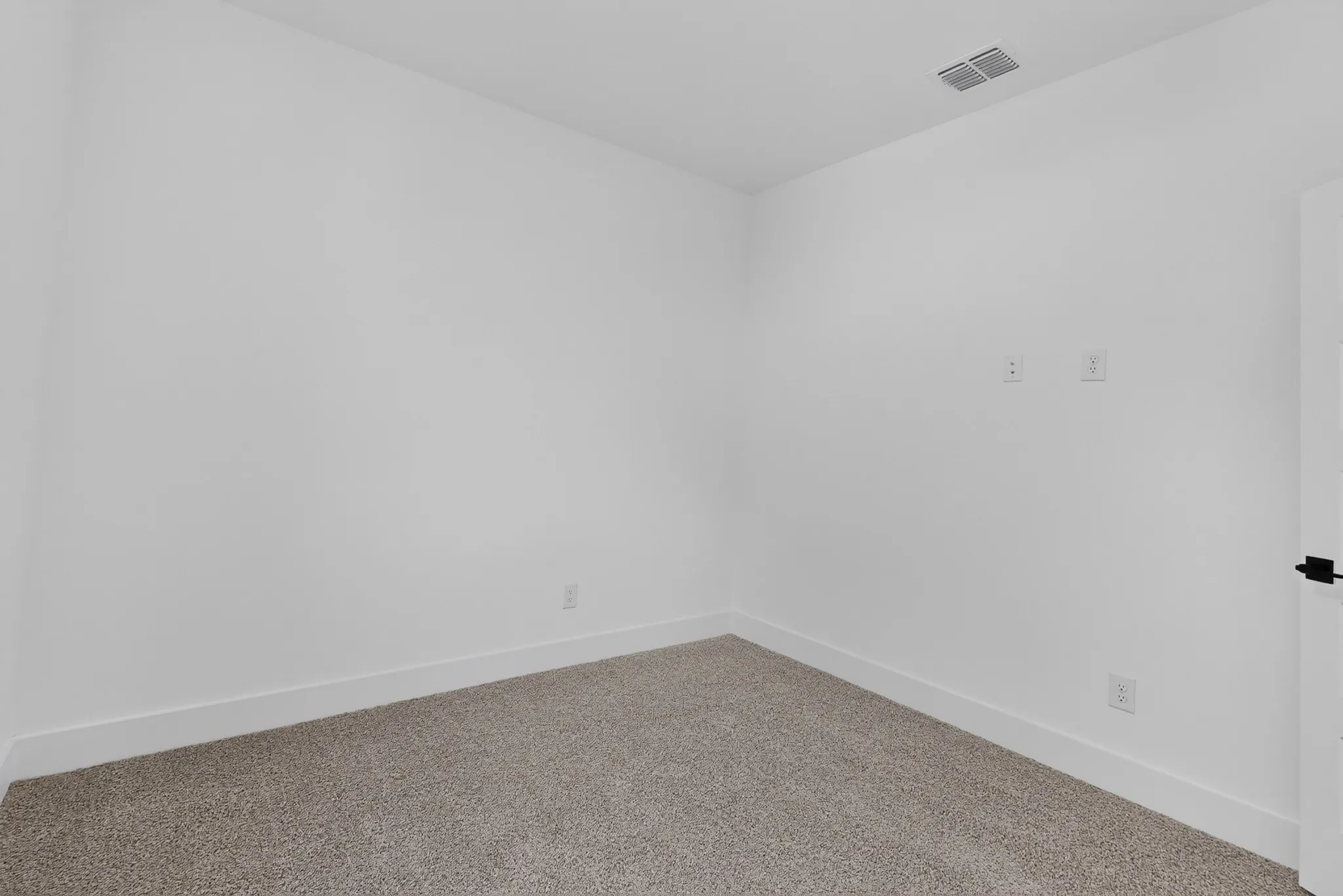 Bedroom with carpet