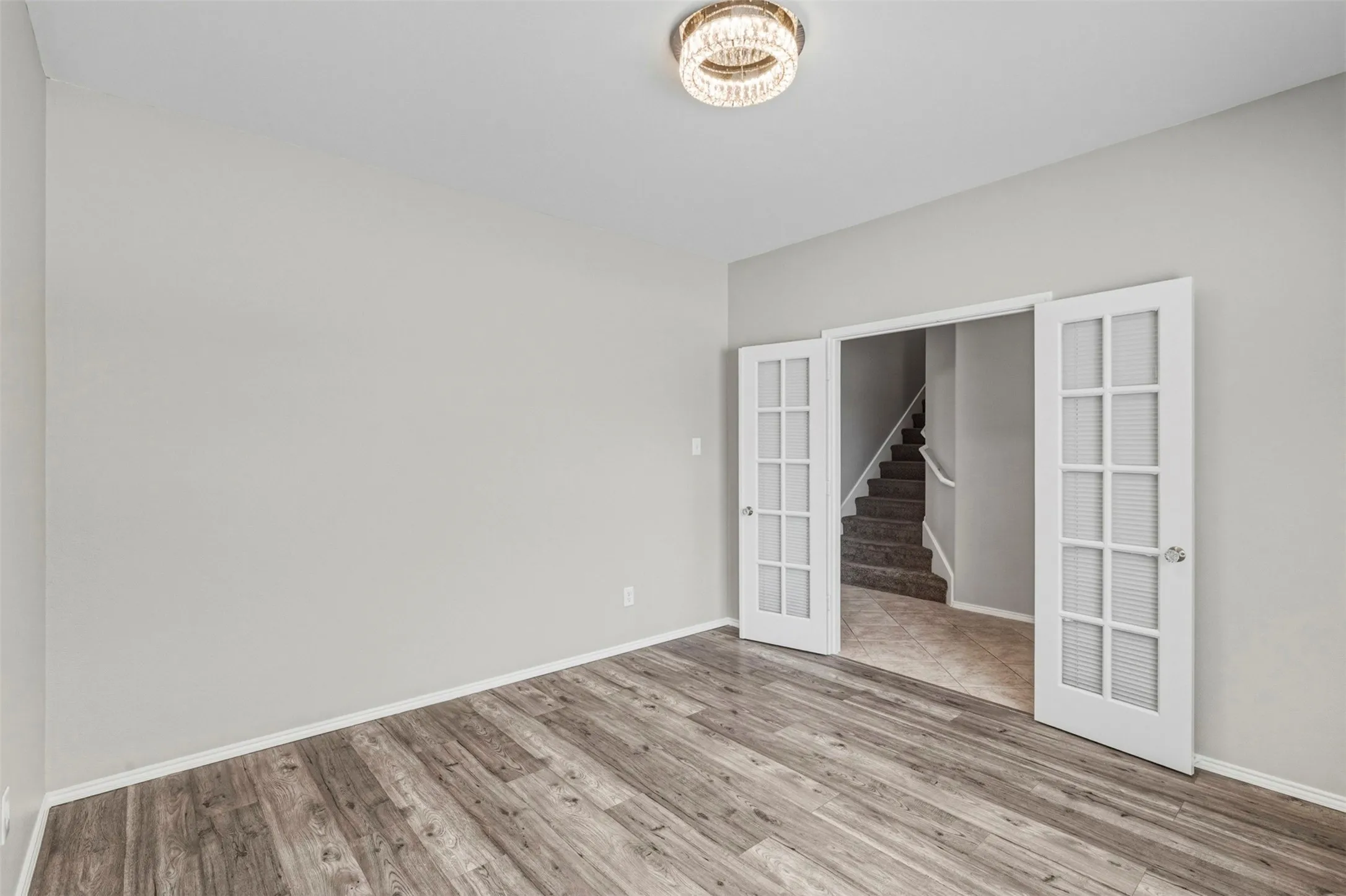Wood-finish flooring with white trim