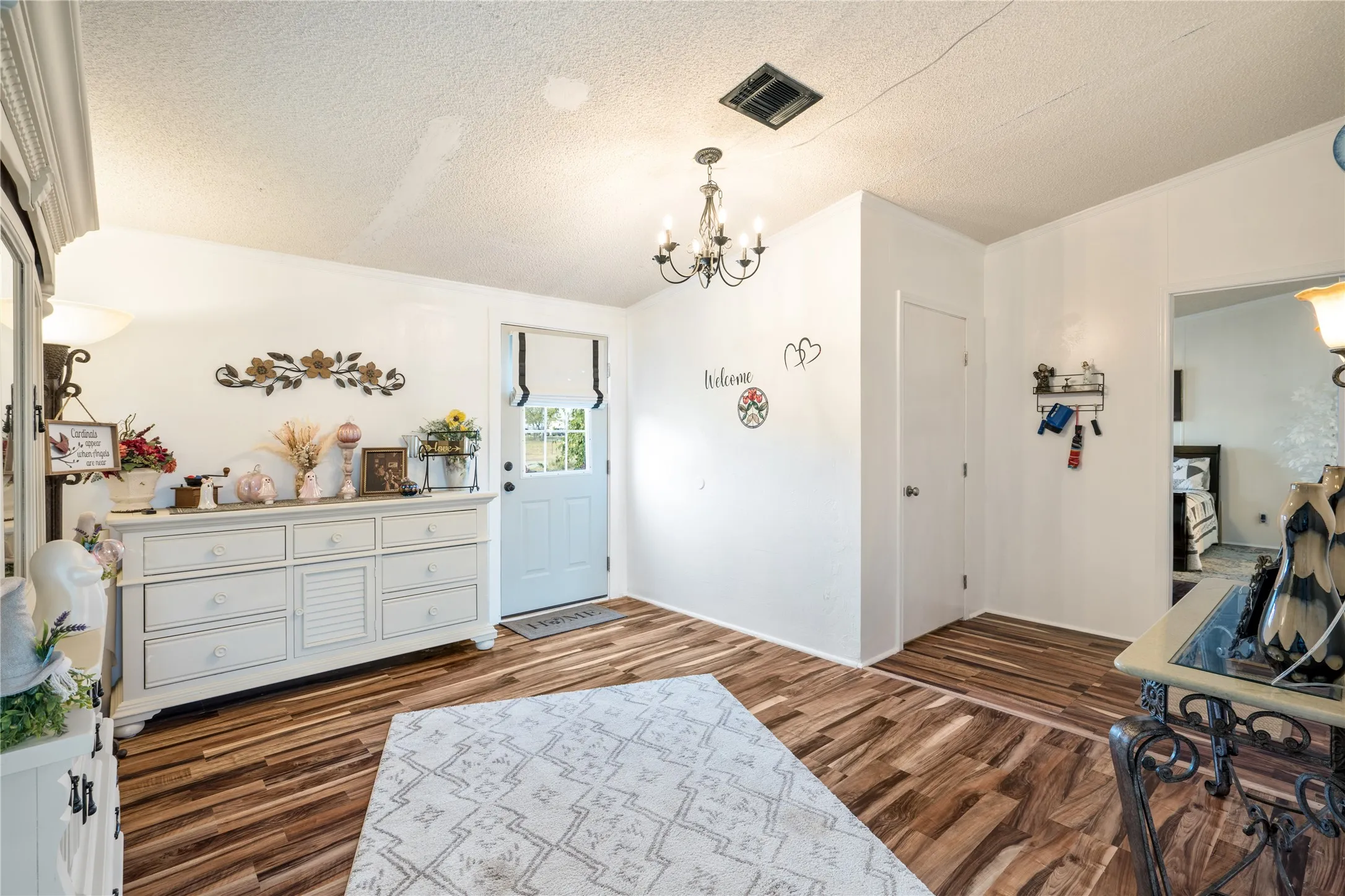 Entrance into foyer or can be a second living area.  Closed door is a large closet.