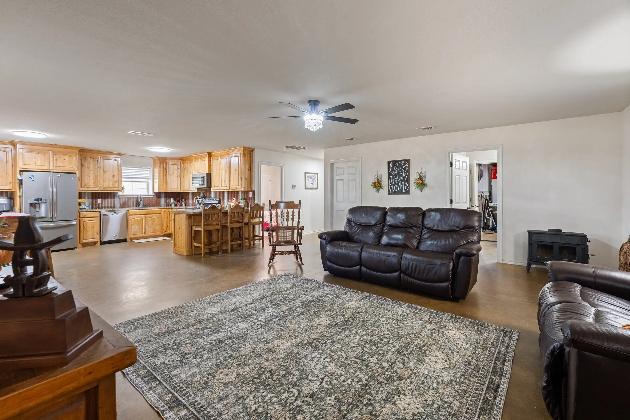Showing living room into the kitchen.