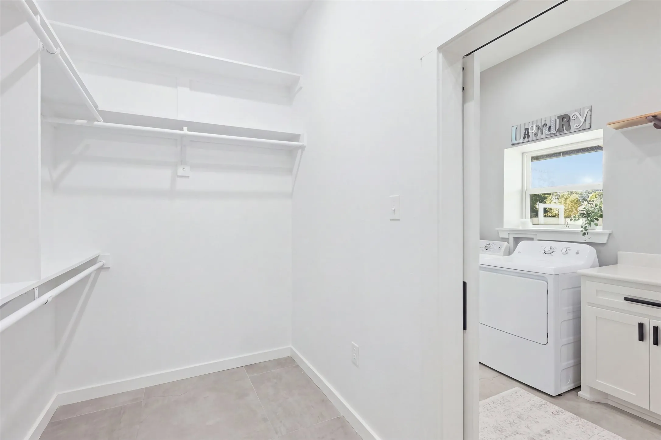 Primary closet connects to laundry room