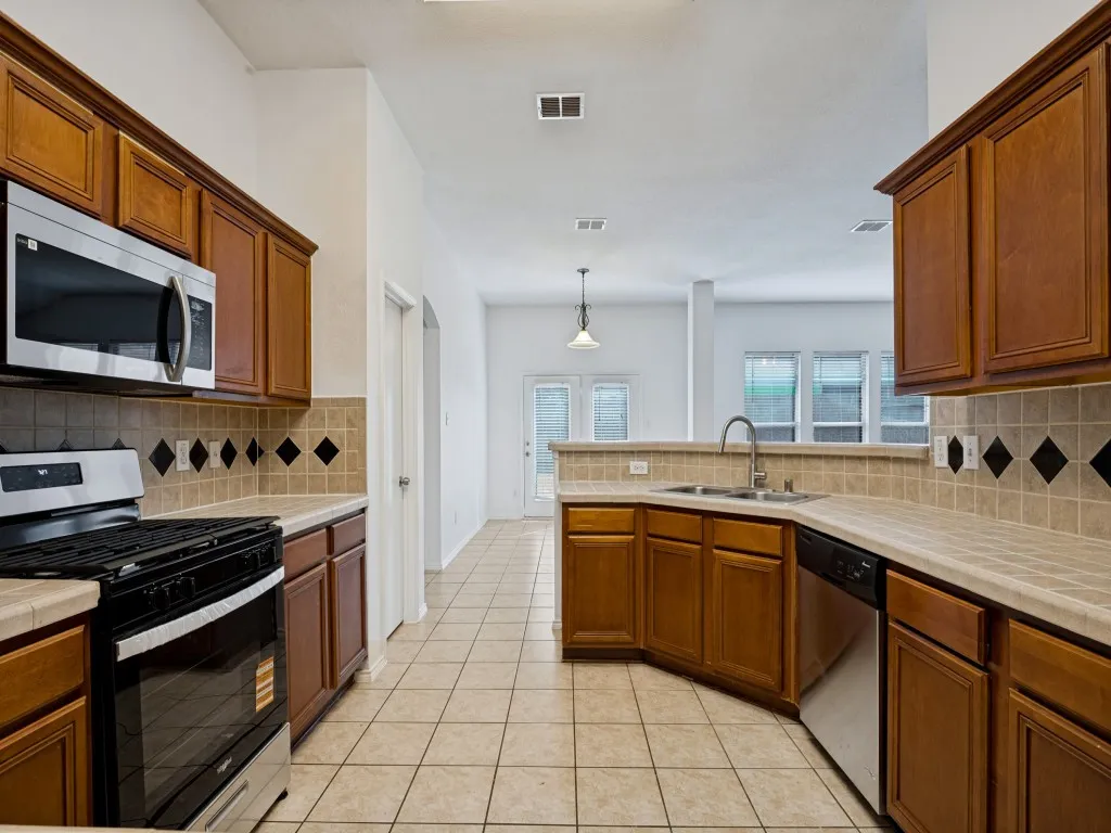Single Family Residence For Sale in Tarrant County , 2459 Frontier Drive, Grand Prairie, Texas 75052, 4 Bedroom, 2 Bathroom, 2 Garage spaces, 2,194 Sqft, built in 2002, mls#21396624, Real Estate Agent in Grand Prairie, Homes For Sale in Tarrant county, Homes For Sale in Grand Prairie, Realtor in Grand Prairie Texas, Real Estate Brokerage Independent Realty Texas, Luminita Cordes Realtor
