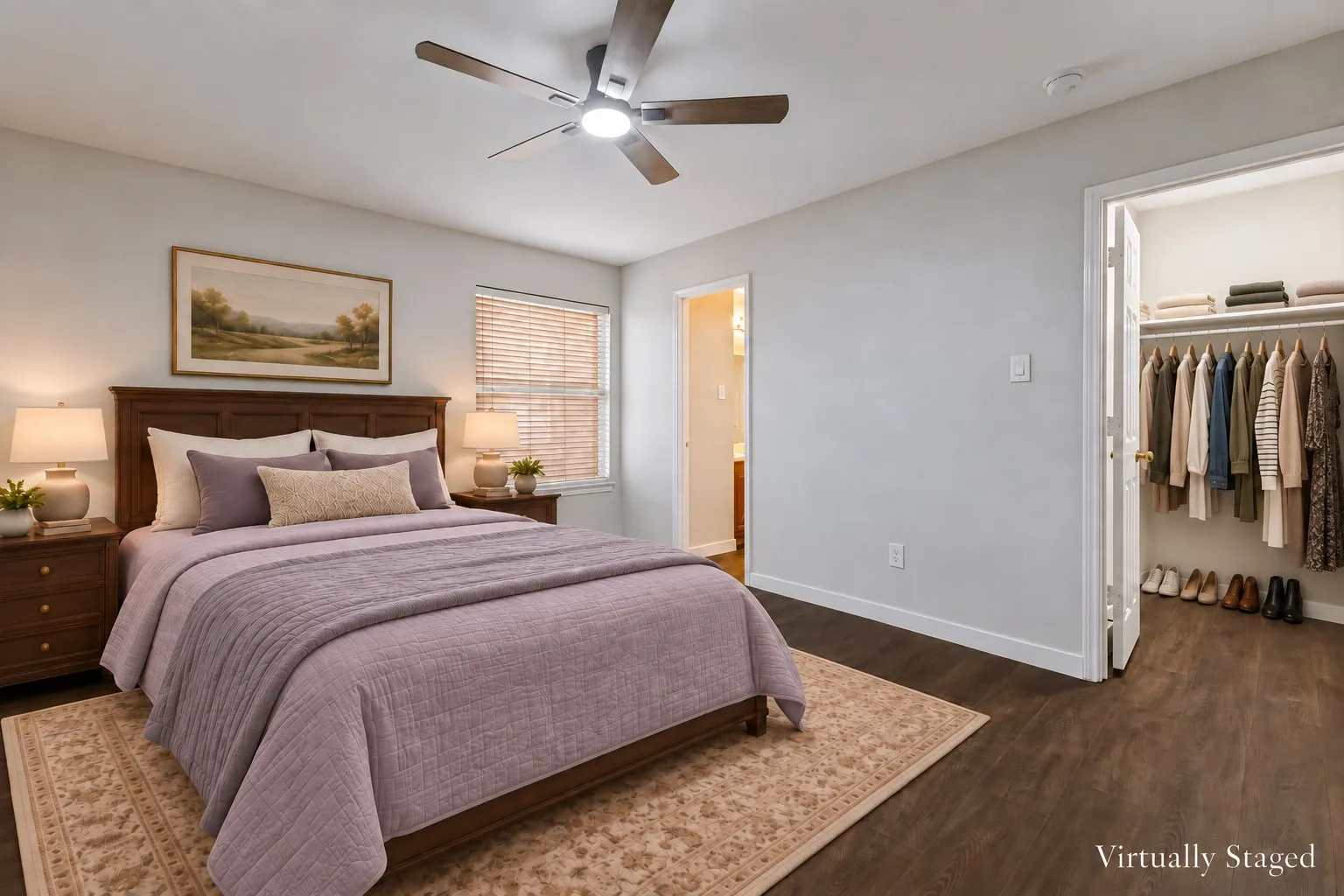 Wood-finish flooring, ceiling fan with integrated lighting, window with blinds, and built-in closet shelving