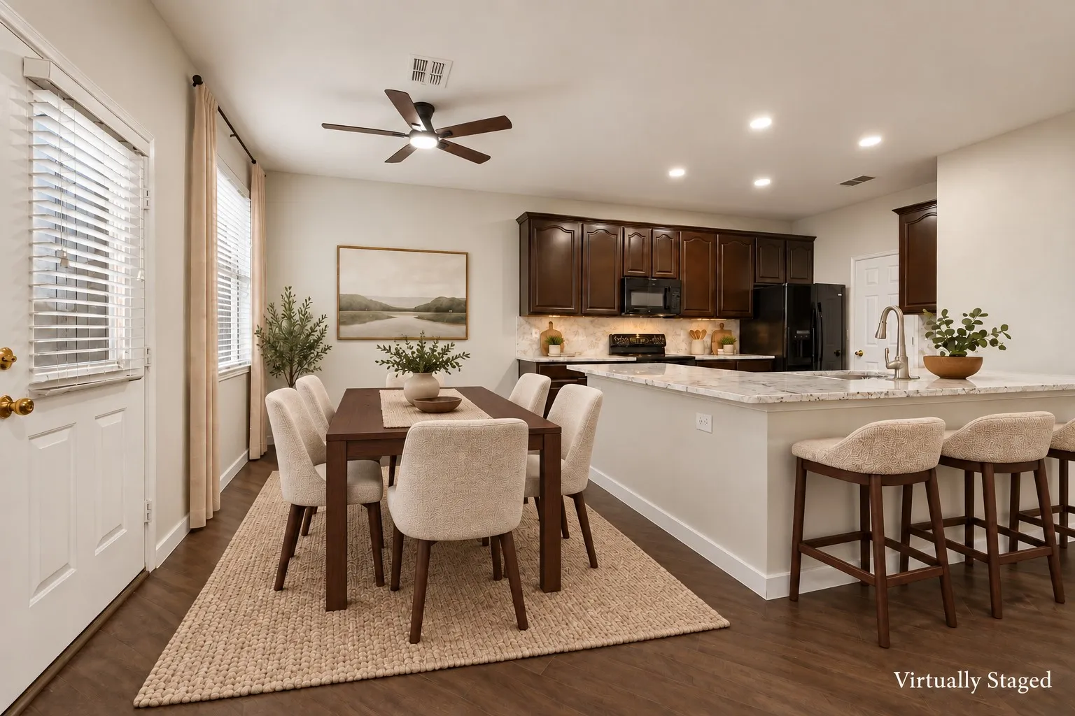 Wood-finish flooring throughout, offering a cohesive aesthetic