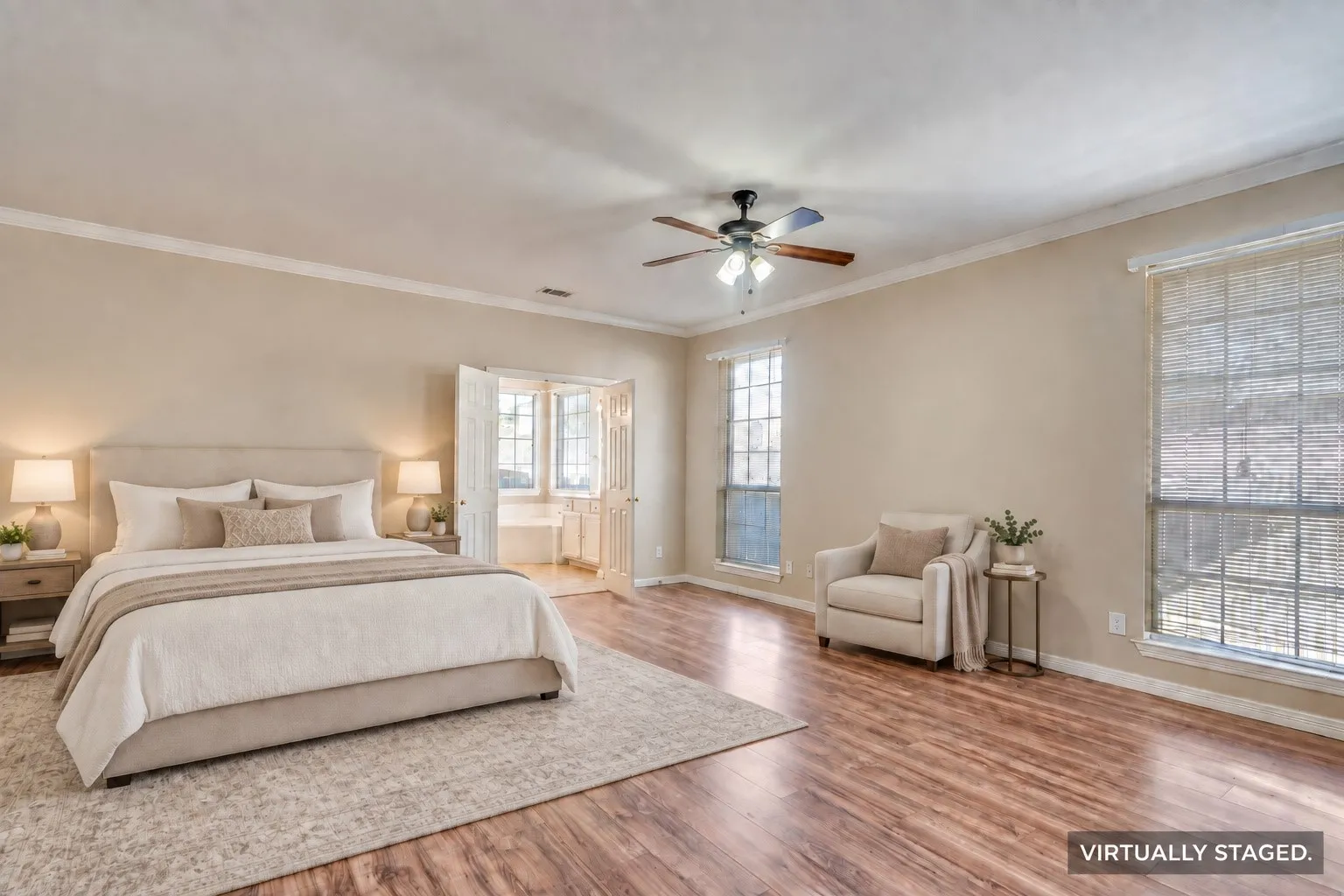 Wood-finish flooring, ceiling fan, and crown molding