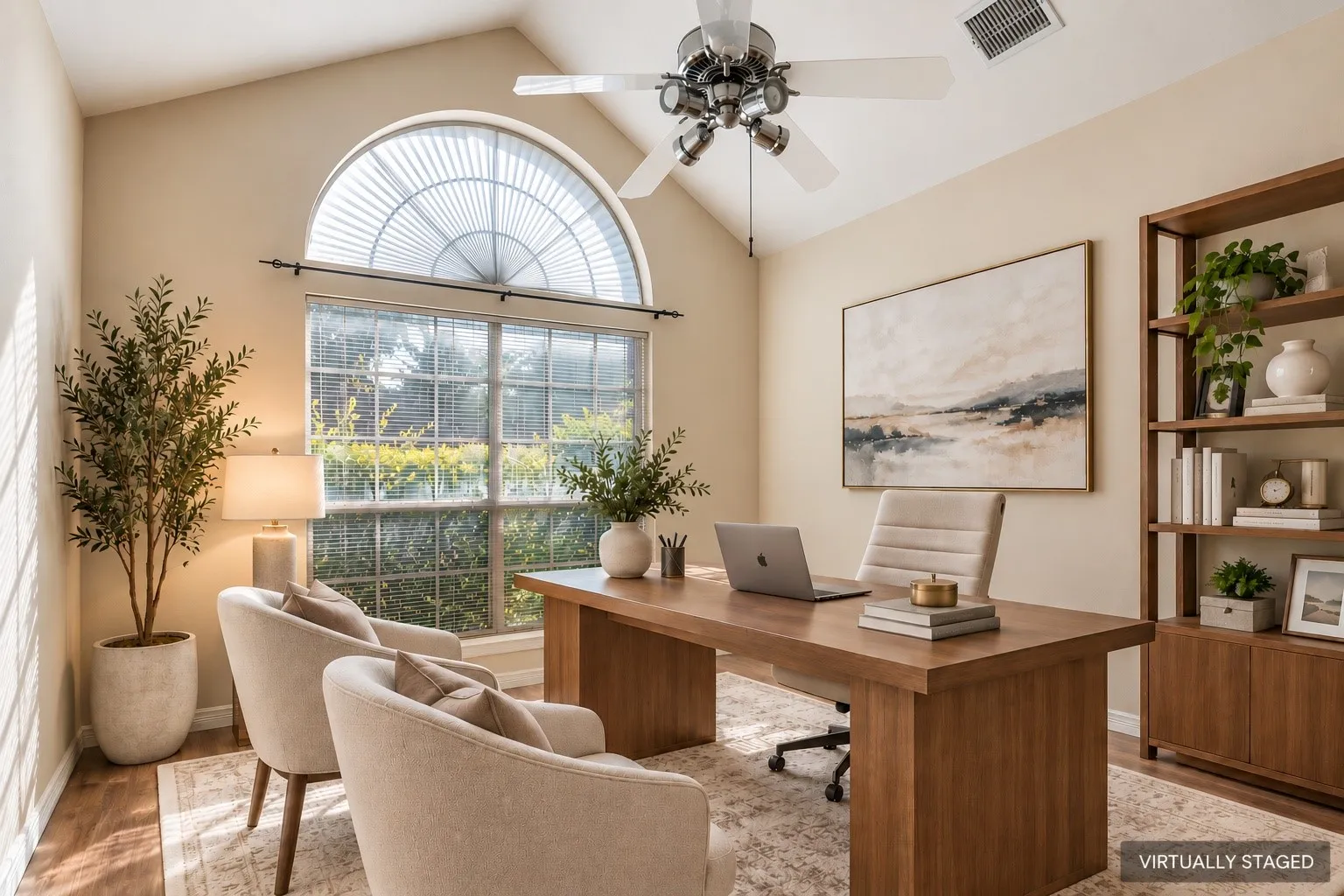 Vaulted ceiling featuring a ceiling fan