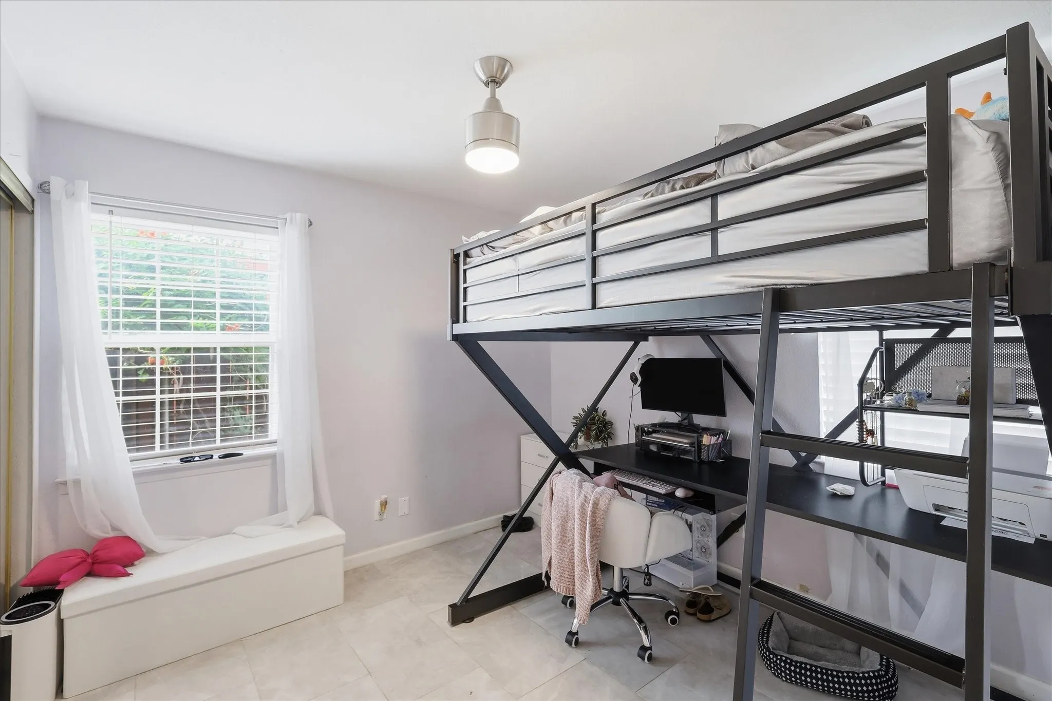Recessed window with blinds, ceiling-mounted light fixture, and tile flooring