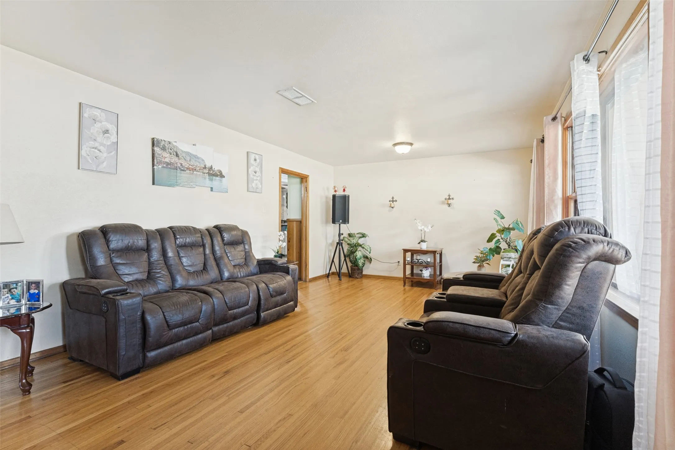 Wood-finish flooring throughout the space