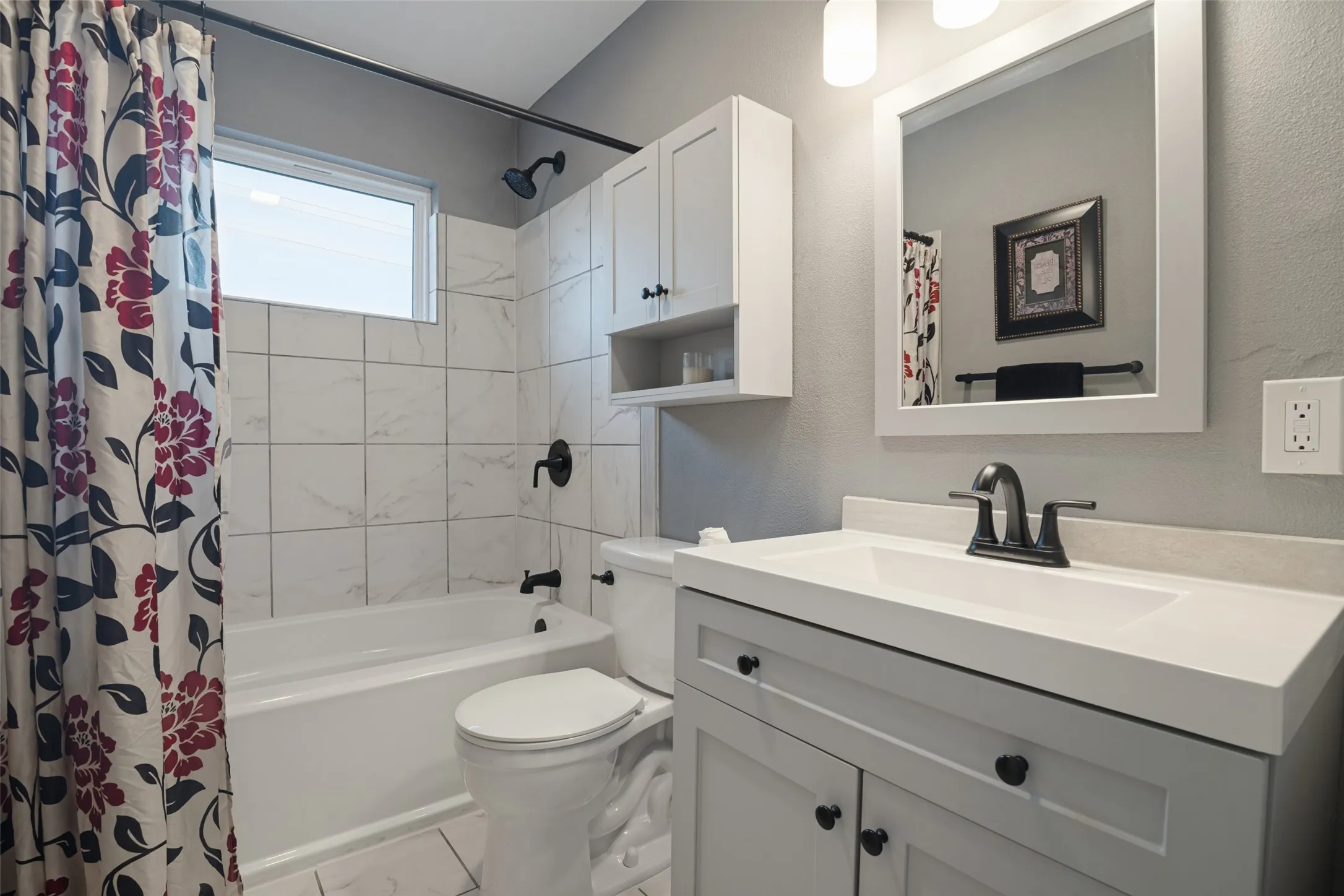 Updated in 2020, this second full bath upstairs is easily accessible from the hallway between two of the secondary bedrooms.