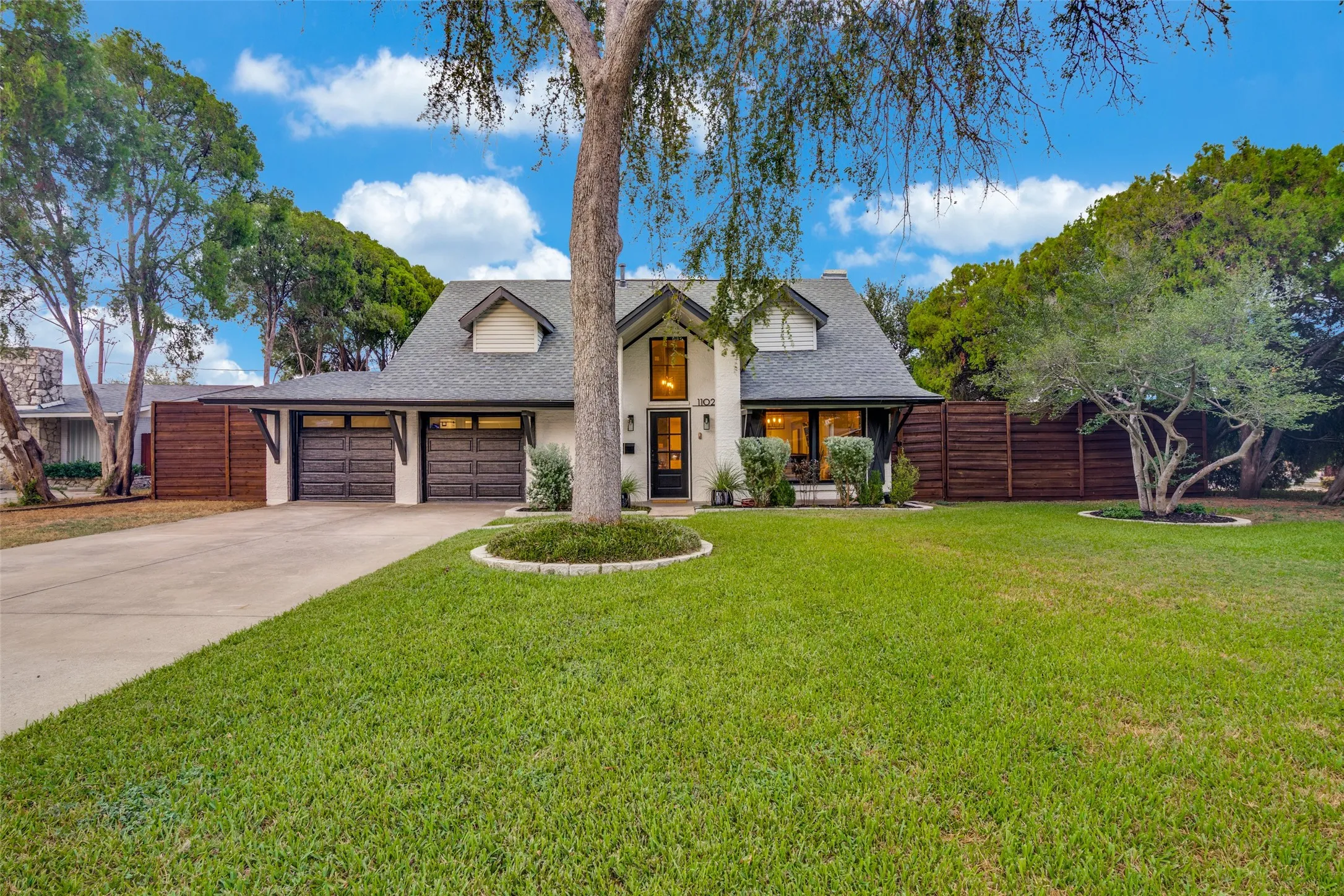Outstanding curb appeal, mature trees, stunning architectural details, and updates galore - including replacement of cast iron sewer lines with PVC in 2020 - offer you the perfect place to call HOME!