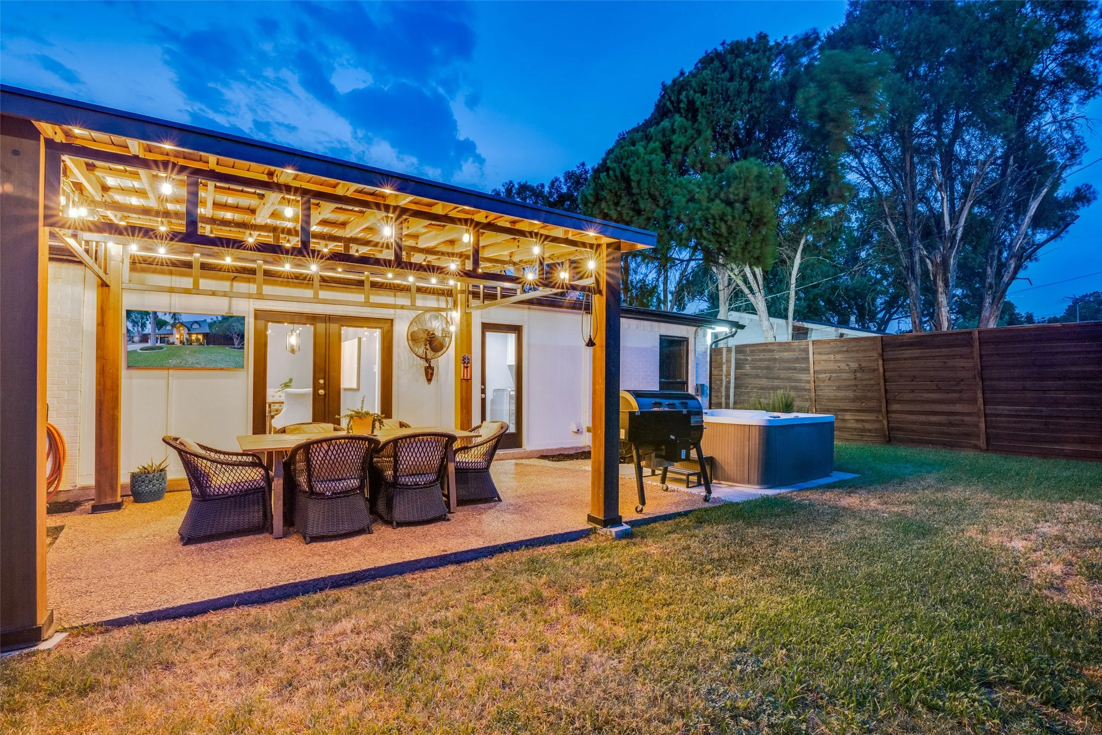 Enjoy the privacy of this outstanding backyard featuring plenty of room for grilling and chilling or relaxing in the spa!