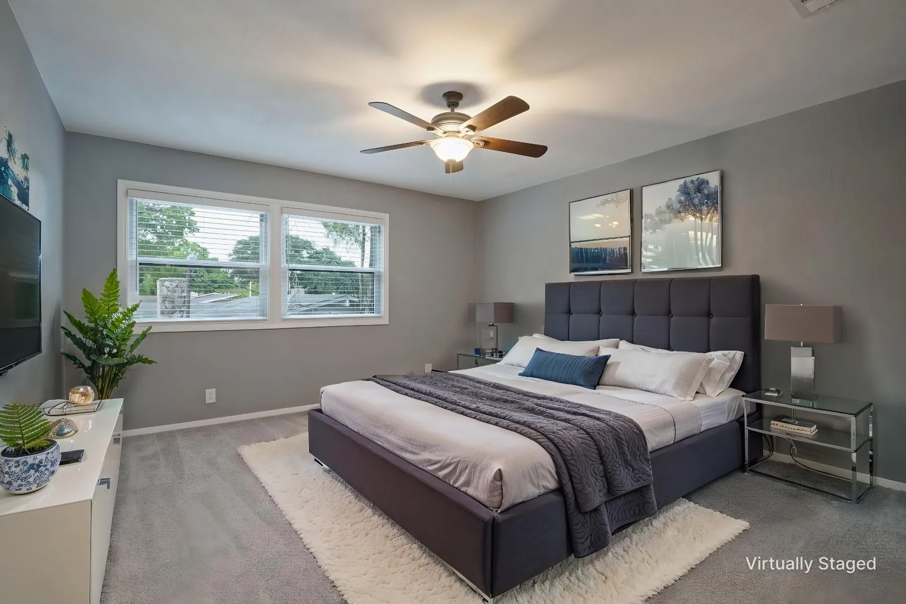 This large upstairs bedroom with a spacious walk-in closet and en-suite bath could be an amazing second primary suite perfect for multi-generational living arrangements.