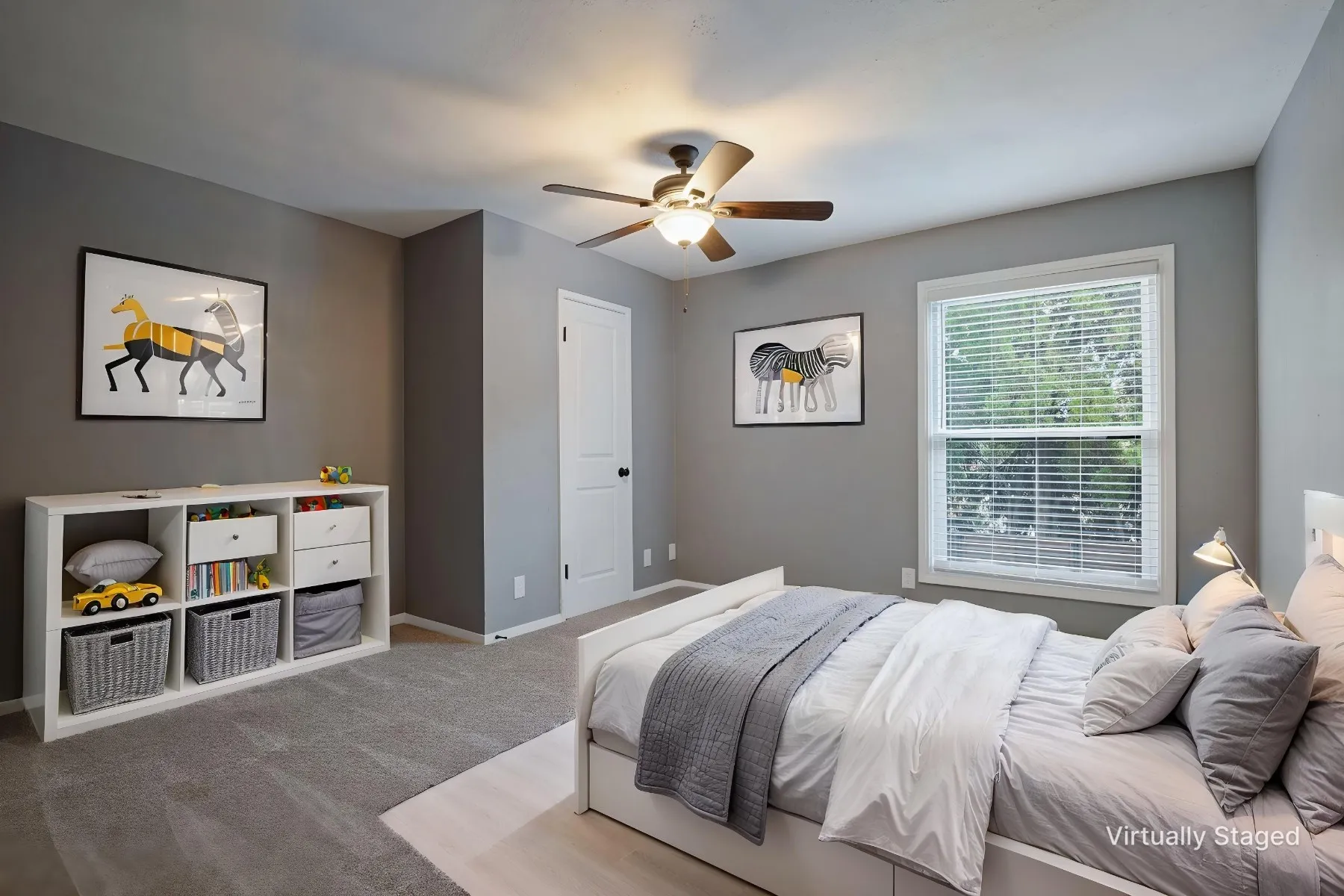 Tucked at the back of the home and overlooking the backyard, this bedroom offers a neutral palette, upgraded ceiling fan, and ample closet space.  All upstairs carpet was replaced in 2020.