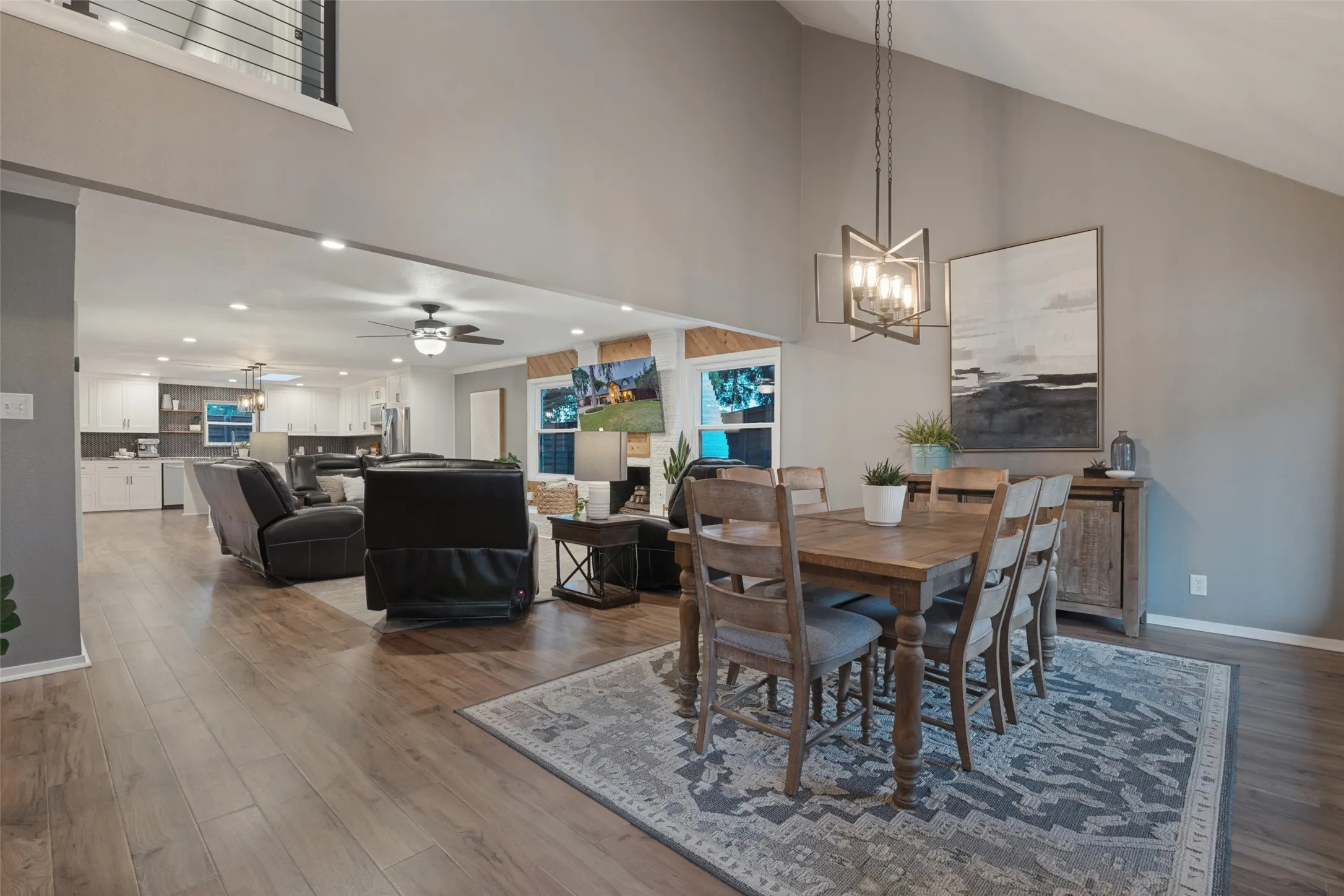 Installation of wide plank, waterproof, Pergo laminate flooring in 2022 throughout the dining, living, kitchen, high traffic, and primary bedroom created a cohesive look and provides for practical upkeep.