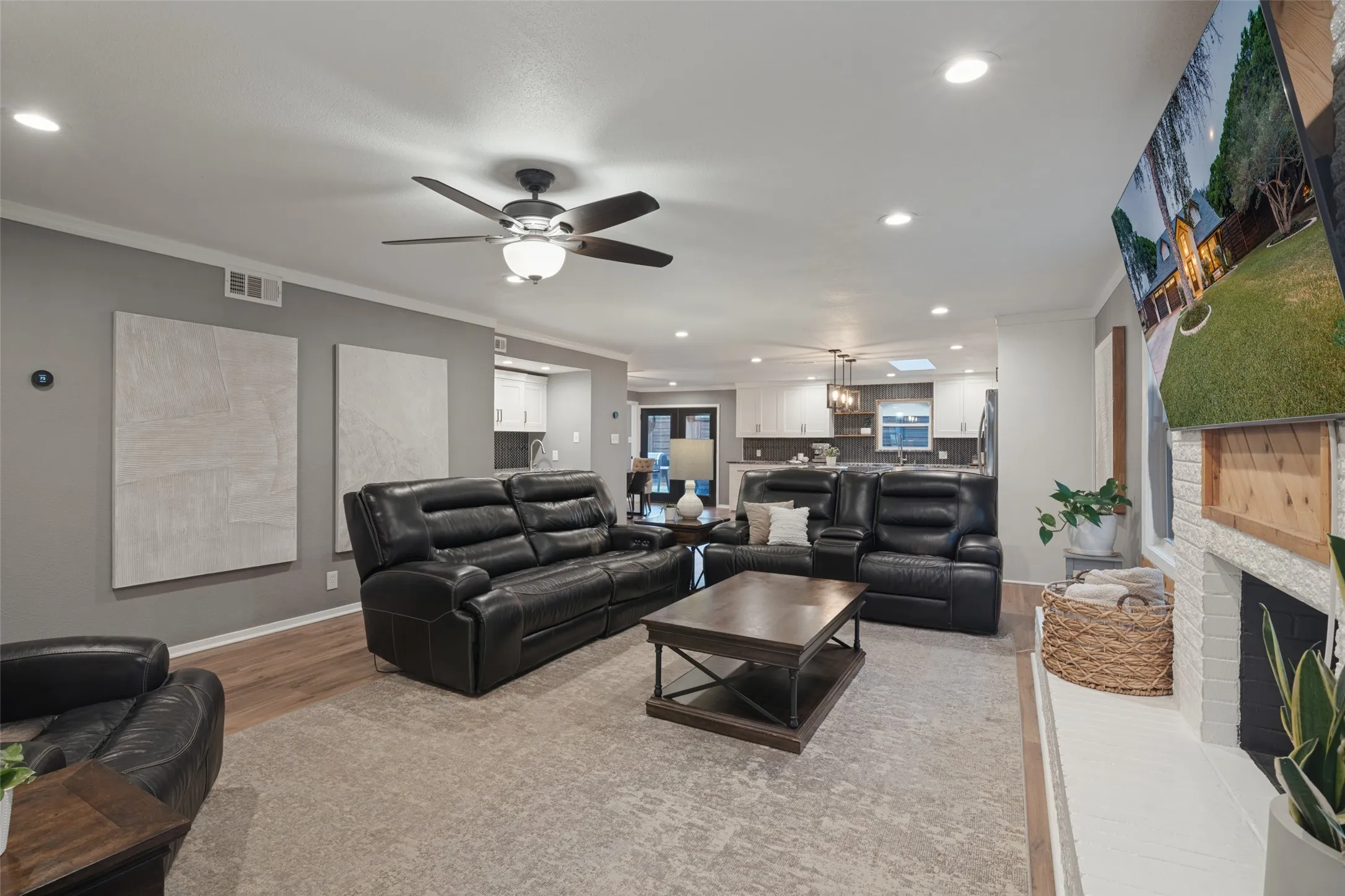 Remodeling in 2021 - 2022 included removal of load bearing walls and addition of added support beams to provide an open floor plan that seamlessly connects the dining, living, and kitchen spaces.