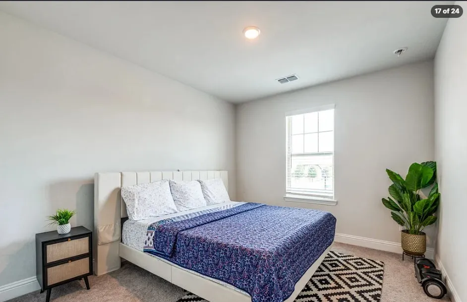 Recessed ceiling lighting, window with blinds, and neutral wall tones