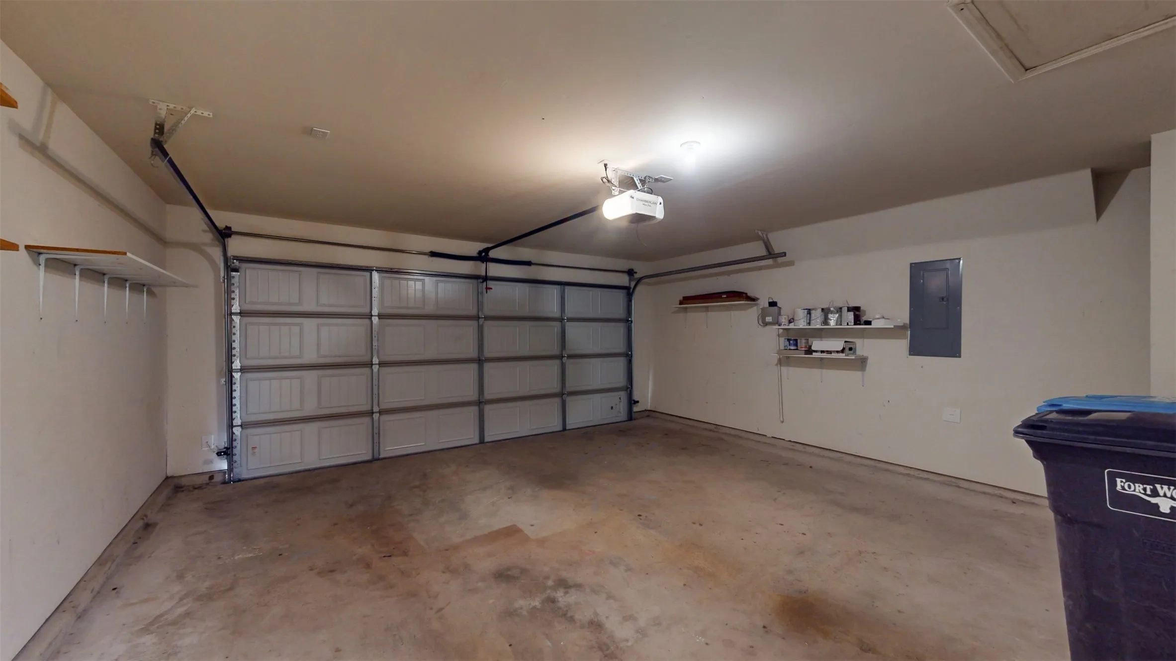Two-car garage with an electric opener.