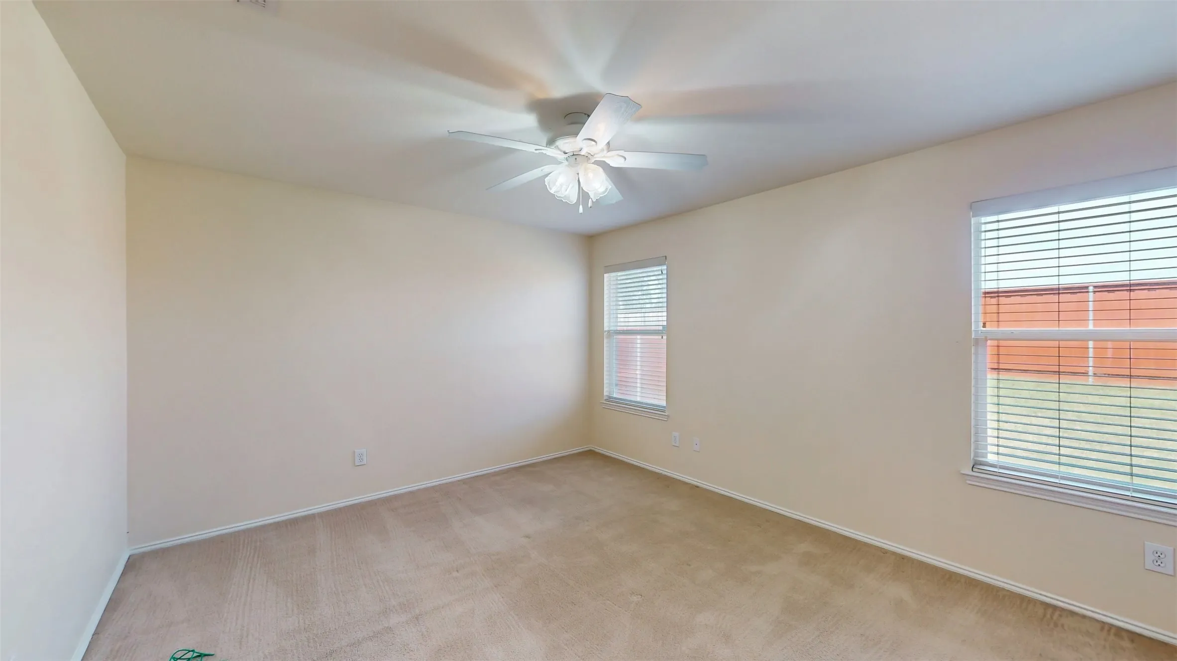 Primary bedroom looks out to the backyard. No back neighbors!