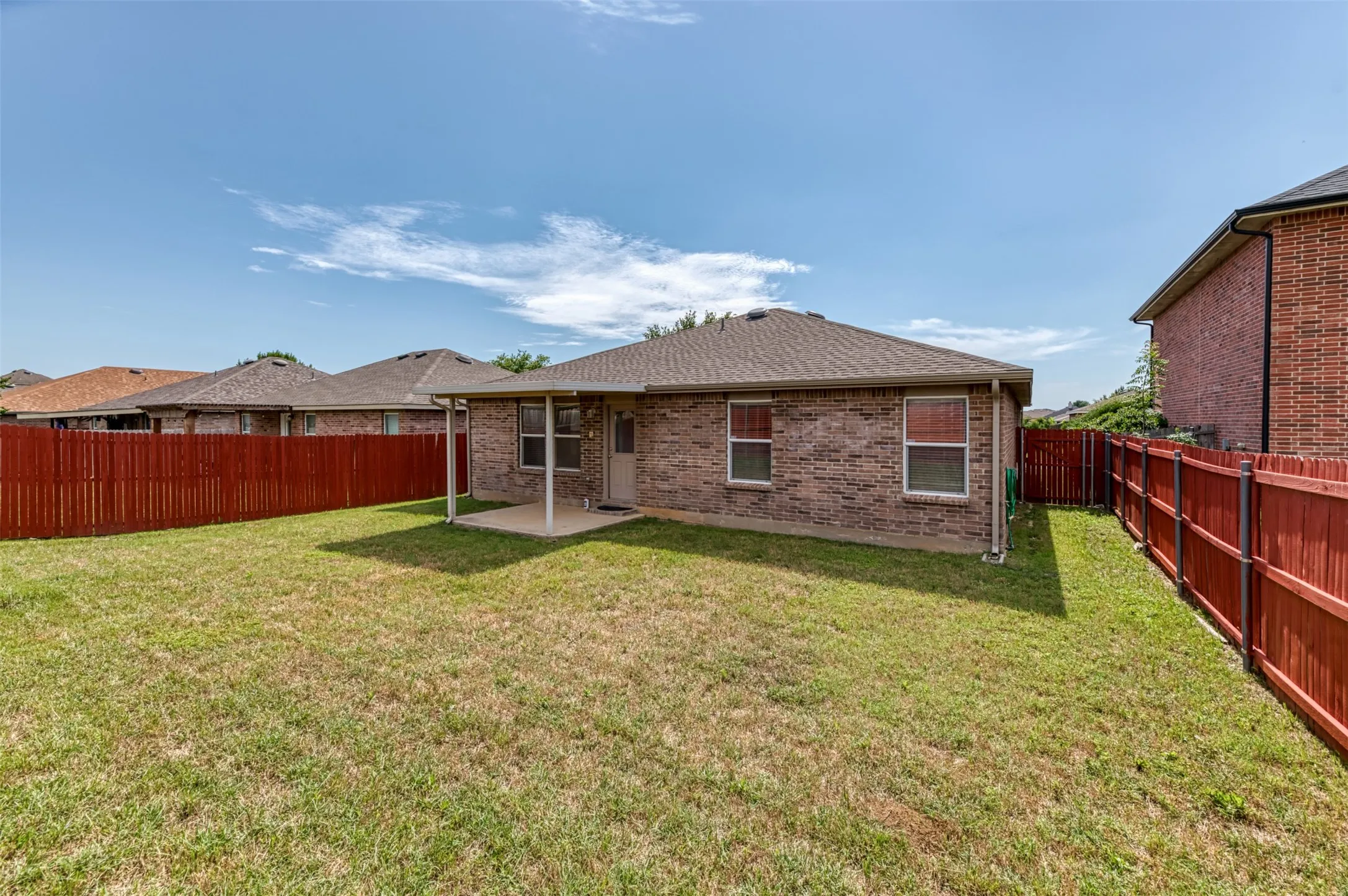 Fully fenced backyard with no back neighbors!