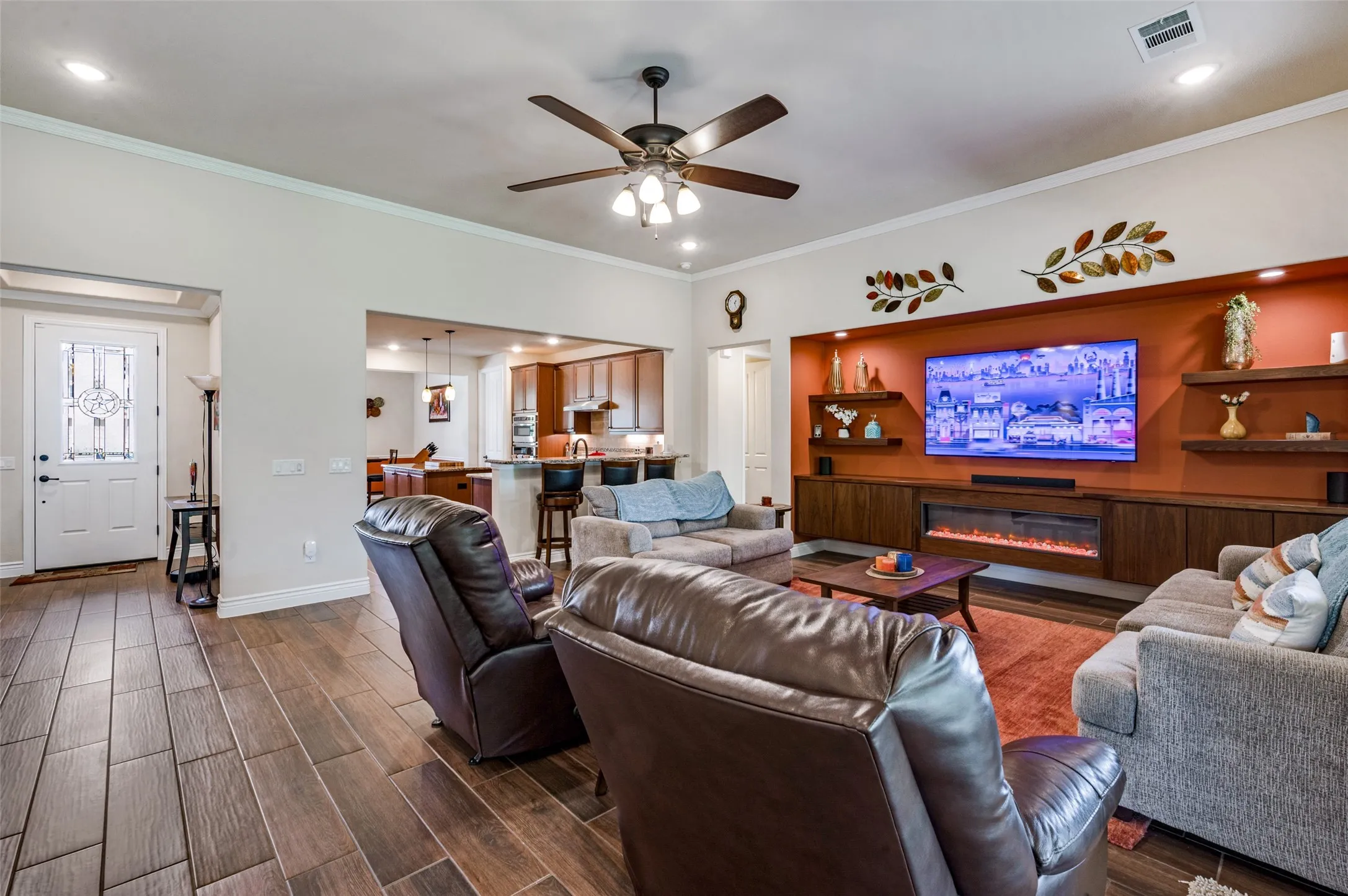 Feature wall with large built in, fireplace and open shelving