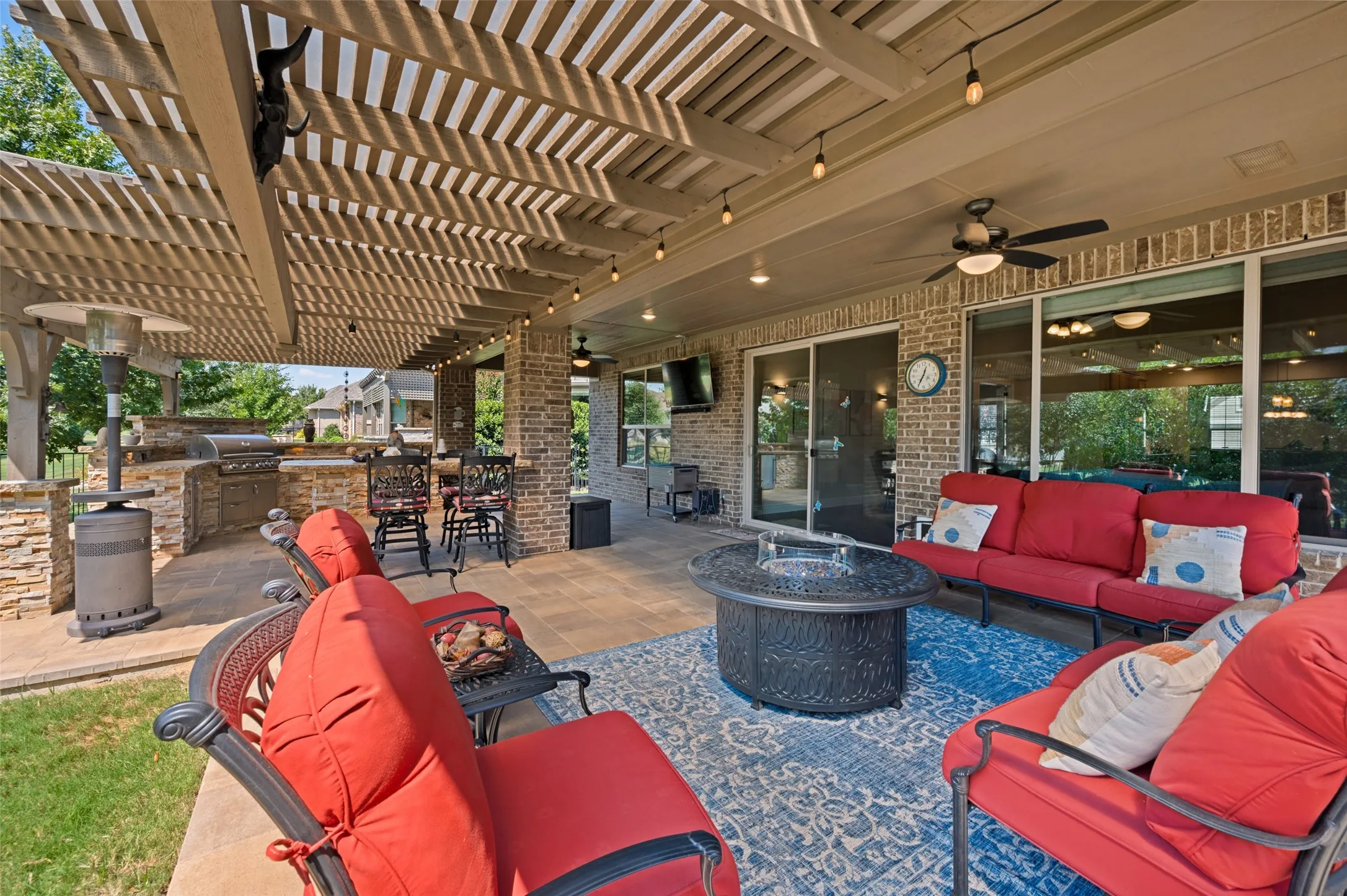Covered Patio plus grass area and landscaped beds