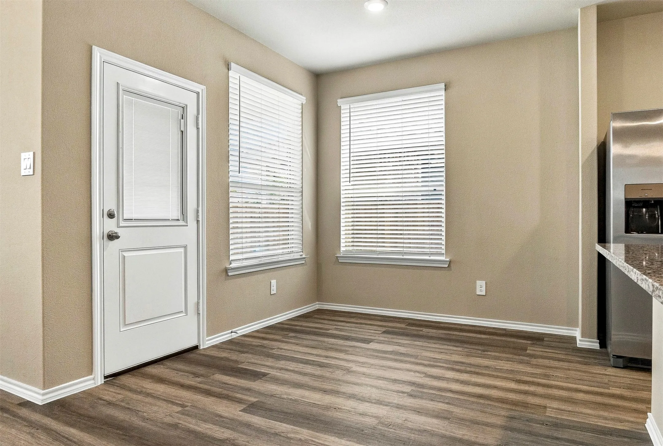 Wood-finish flooring with neutral wall paint