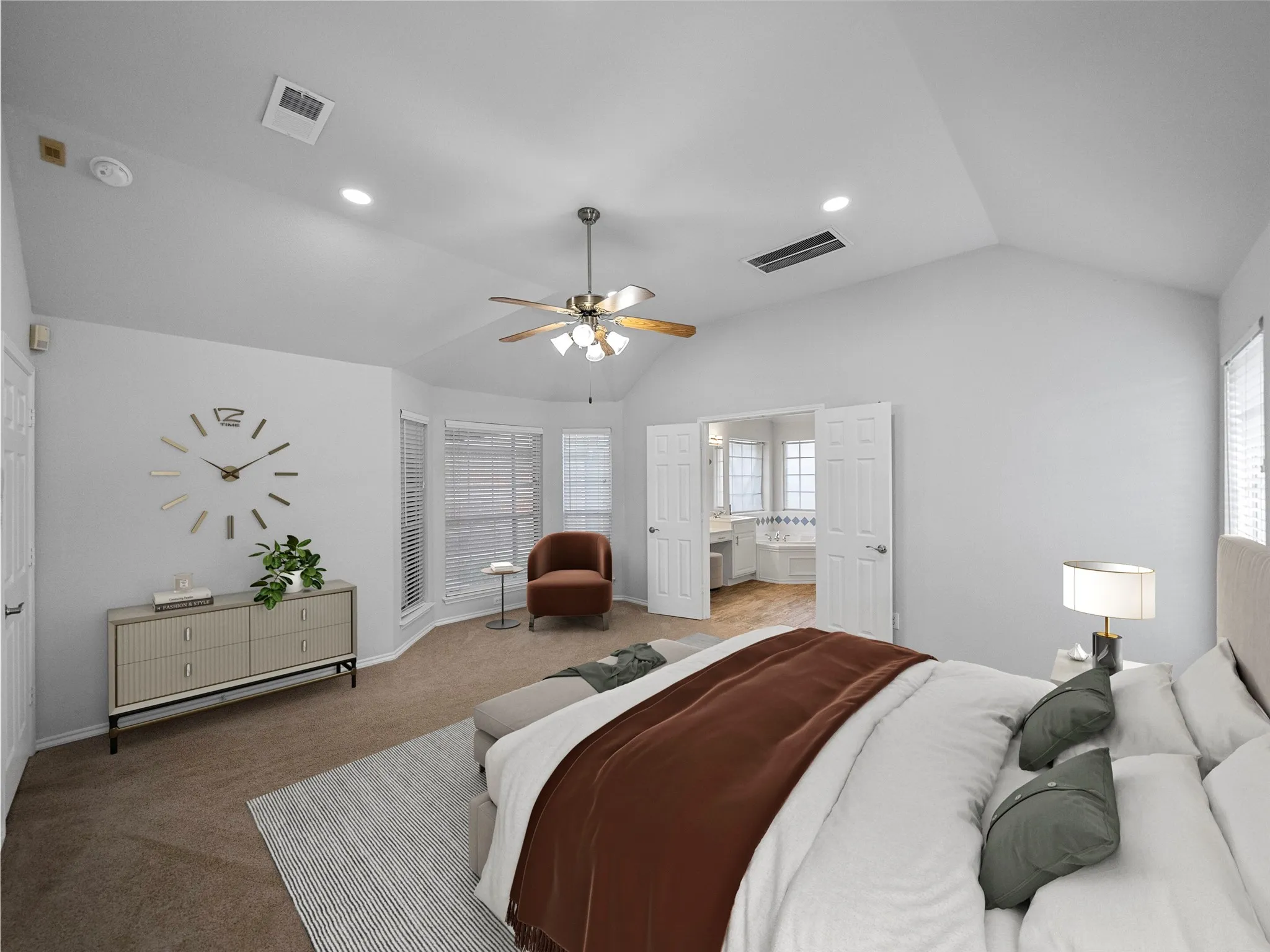Vaulted ceiling with recessed lighting and ceiling fan