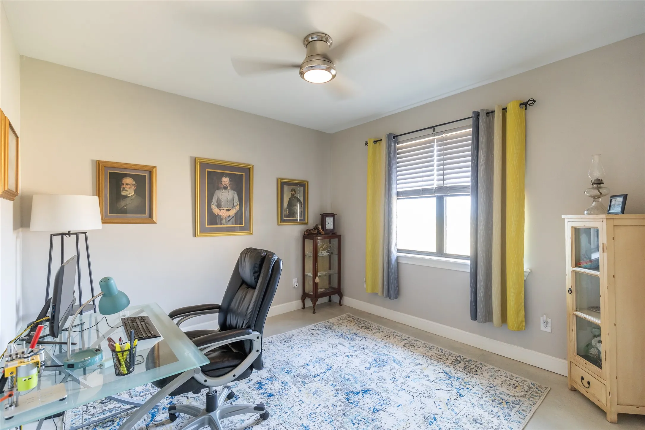Window with blinds, overhead ceiling fan, and light-toned wall​​‌​​​​‌​​‌‌​‌‌​​​‌‌​‌​‌​‌​​​‌​​ paint
