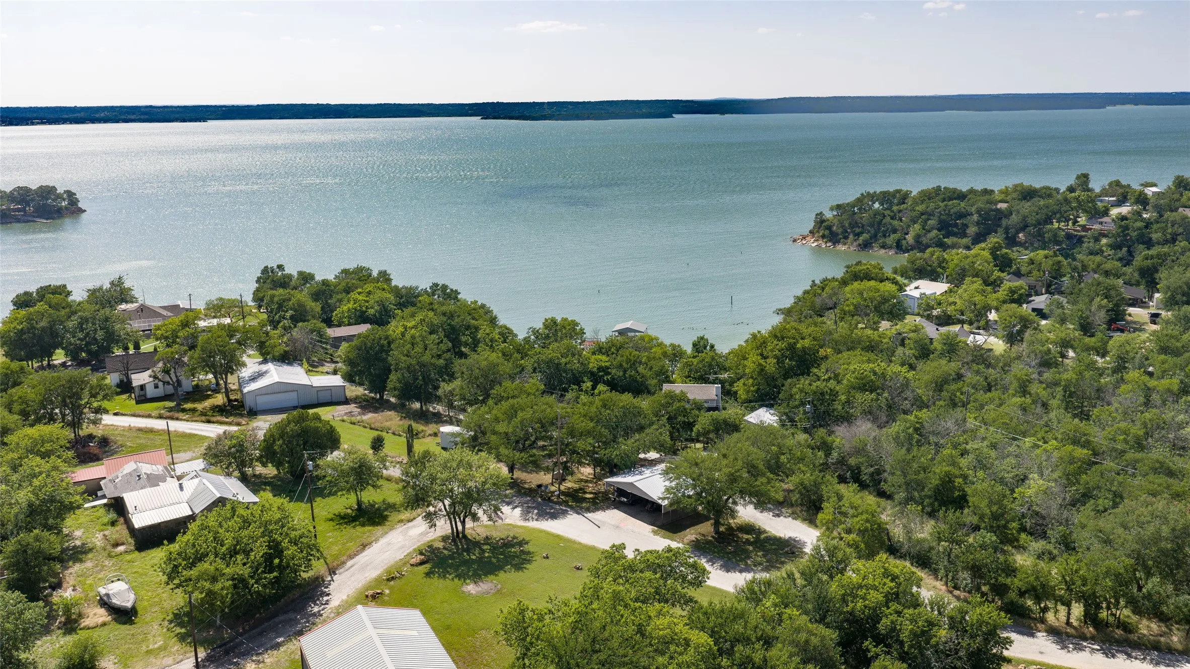 Single Family Residence For Rent in Wise County , 402 Aqua Way, Lake Bridgeport, Texas 76426, 2 Bedroom, 2 Bathroom, Garage spaces, 1,200 Sqft, built in 1995, mls#21396893, Real Estate Agent in Lake Bridgeport, Homes For Rent in Wise county, Homes For Rent in Lake Bridgeport, Realtor in Lake Bridgeport Texas, Real Estate Brokerage Independent Realty Texas, Luminita Cordes Realtor
