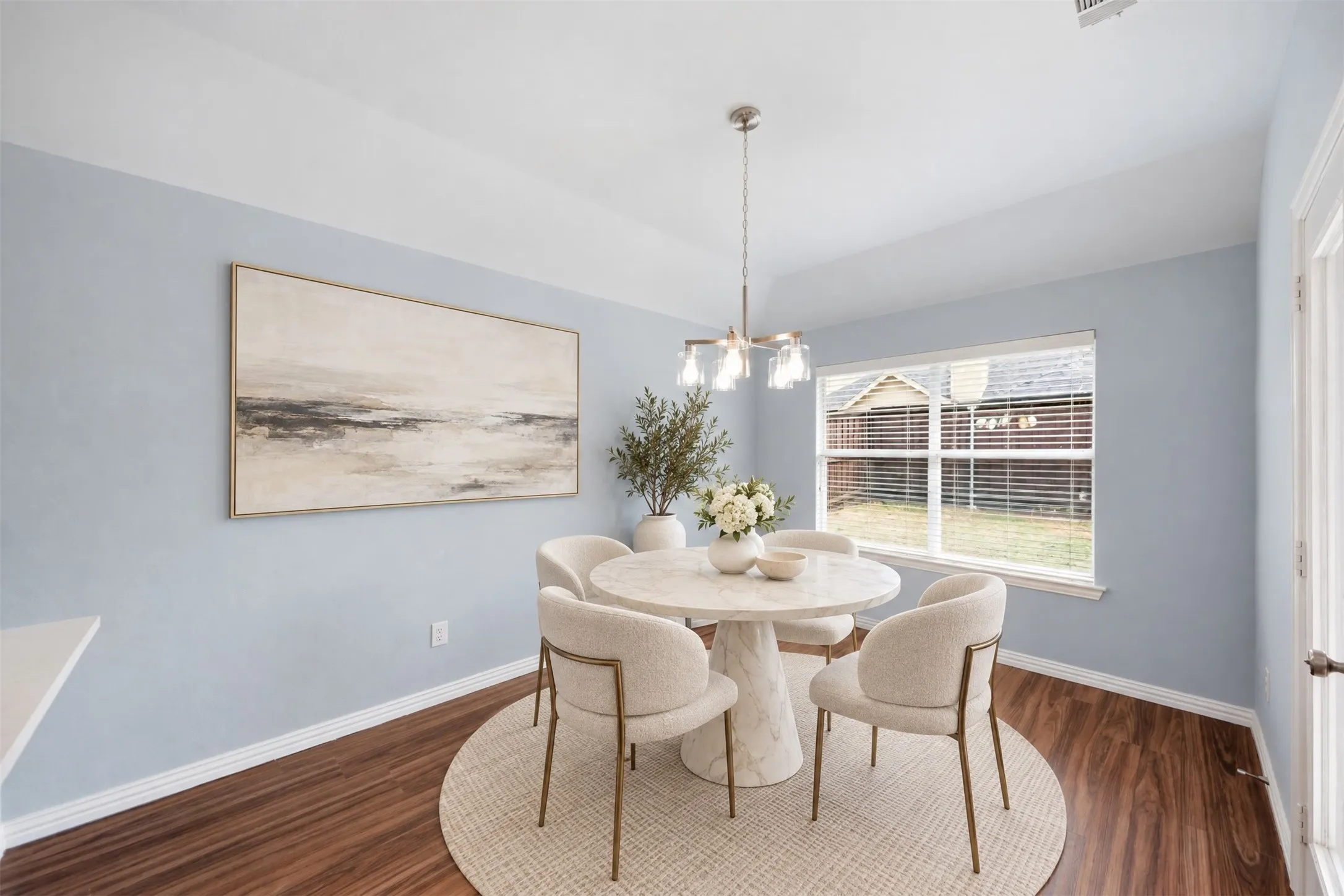 The breakfast area offers a comfortable spot for morning coffee, casual meals, and conversations that linger a little longer. Virtual staged