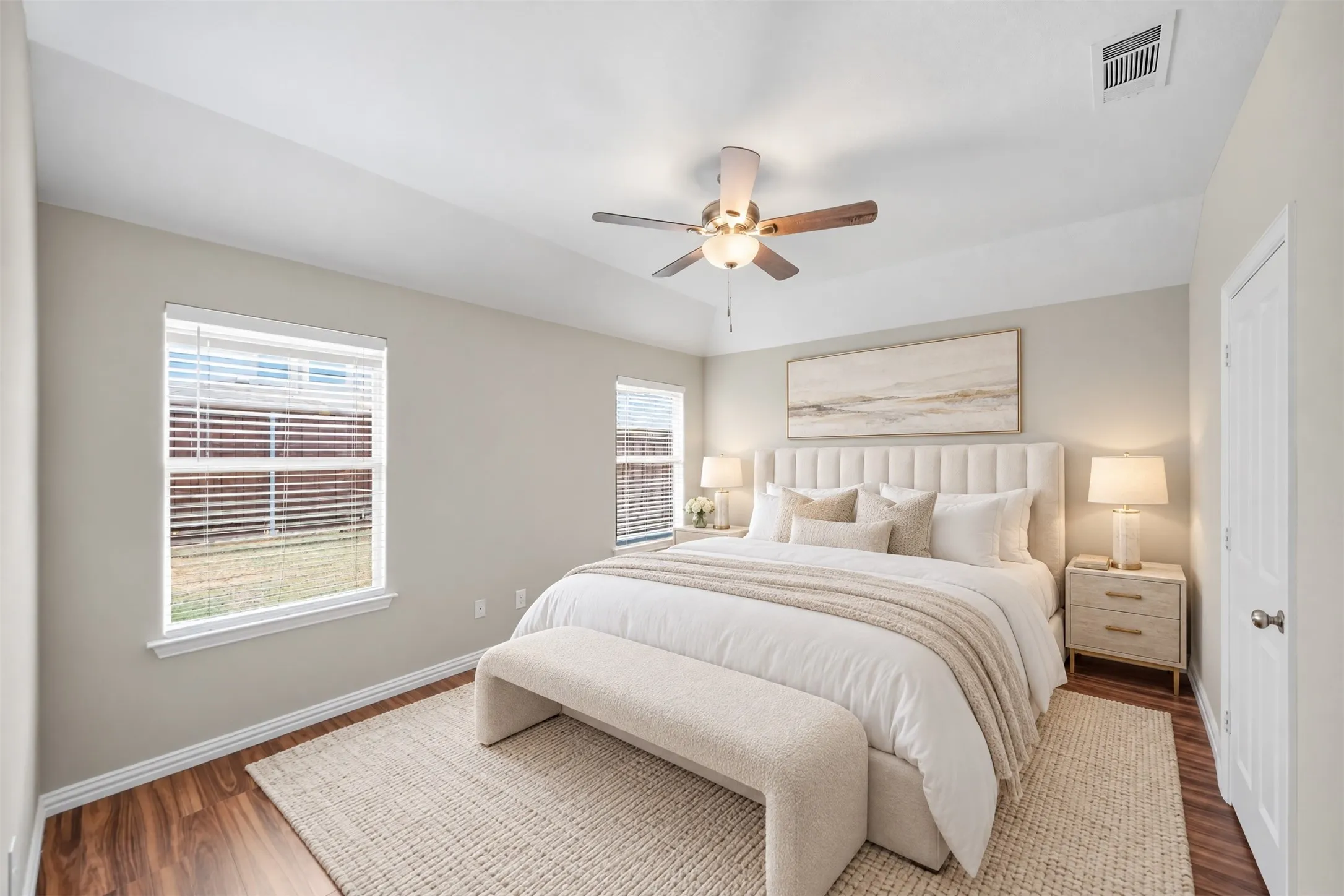 Retreat to a spacious primary suite with a view of the backyard—a peaceful place to start and end your day. New quartz vanity tops add a fresh, polished touch to the bathroom. Virtual staged
