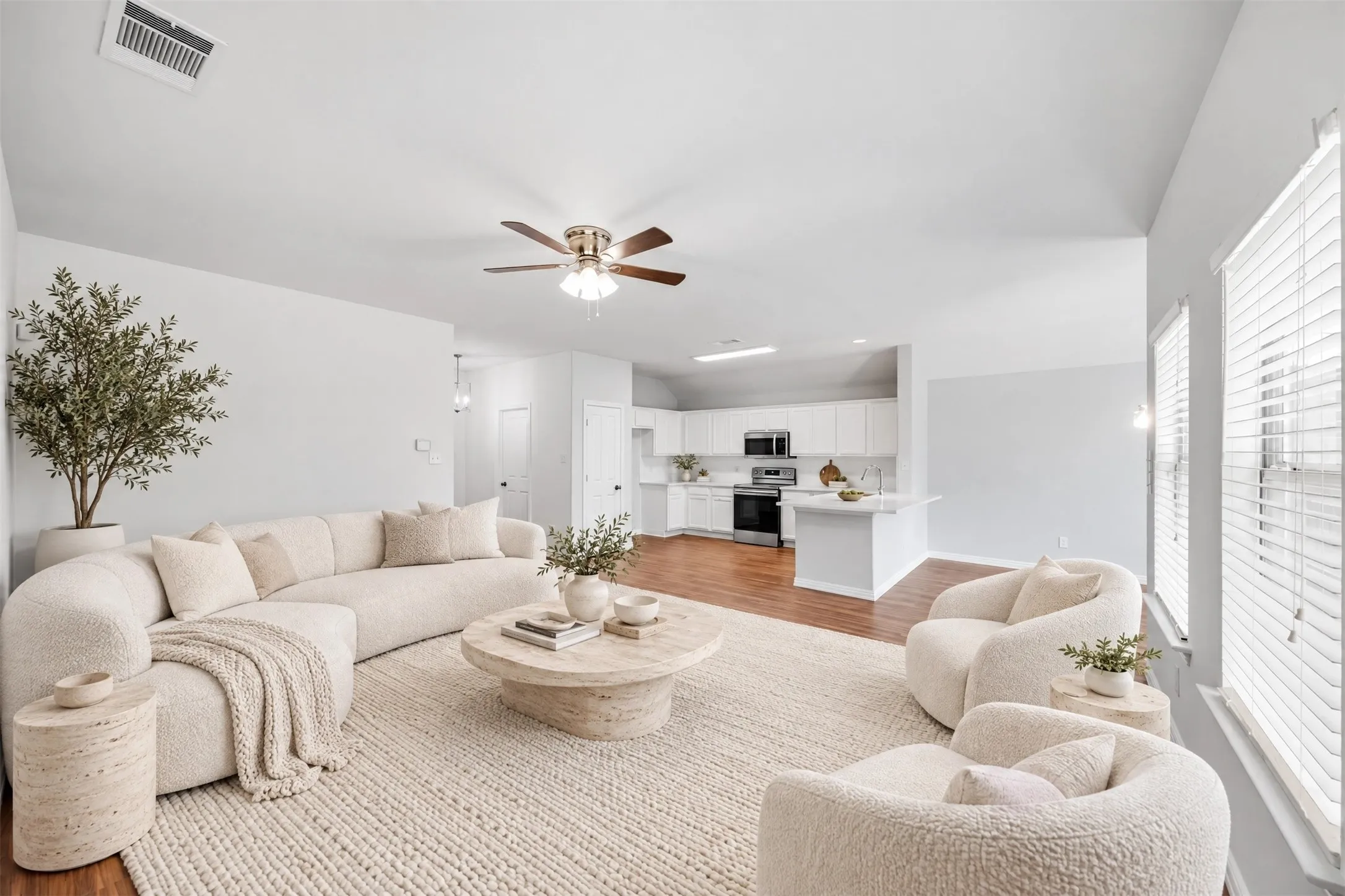 The heart of the home brings the family room, kitchen, and dining area together in one inviting space—perfect for sharing a meal, catching up at the end of the day, or welcoming friends over.
Virtual staged