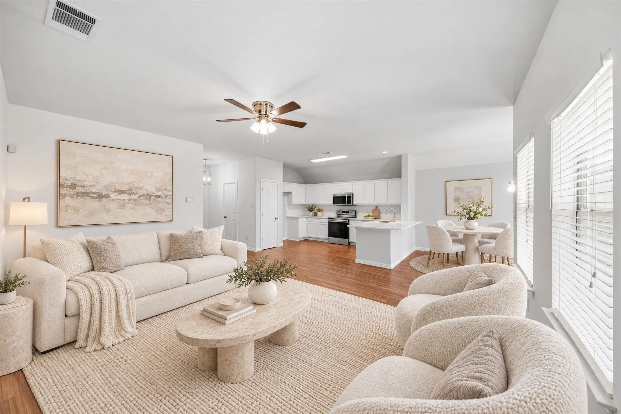 The heart of the home brings the family room, kitchen, and dining area together in one inviting space—perfect for sharing a meal, catching up at the end of the day, or welcoming friends over.
Virtual staged