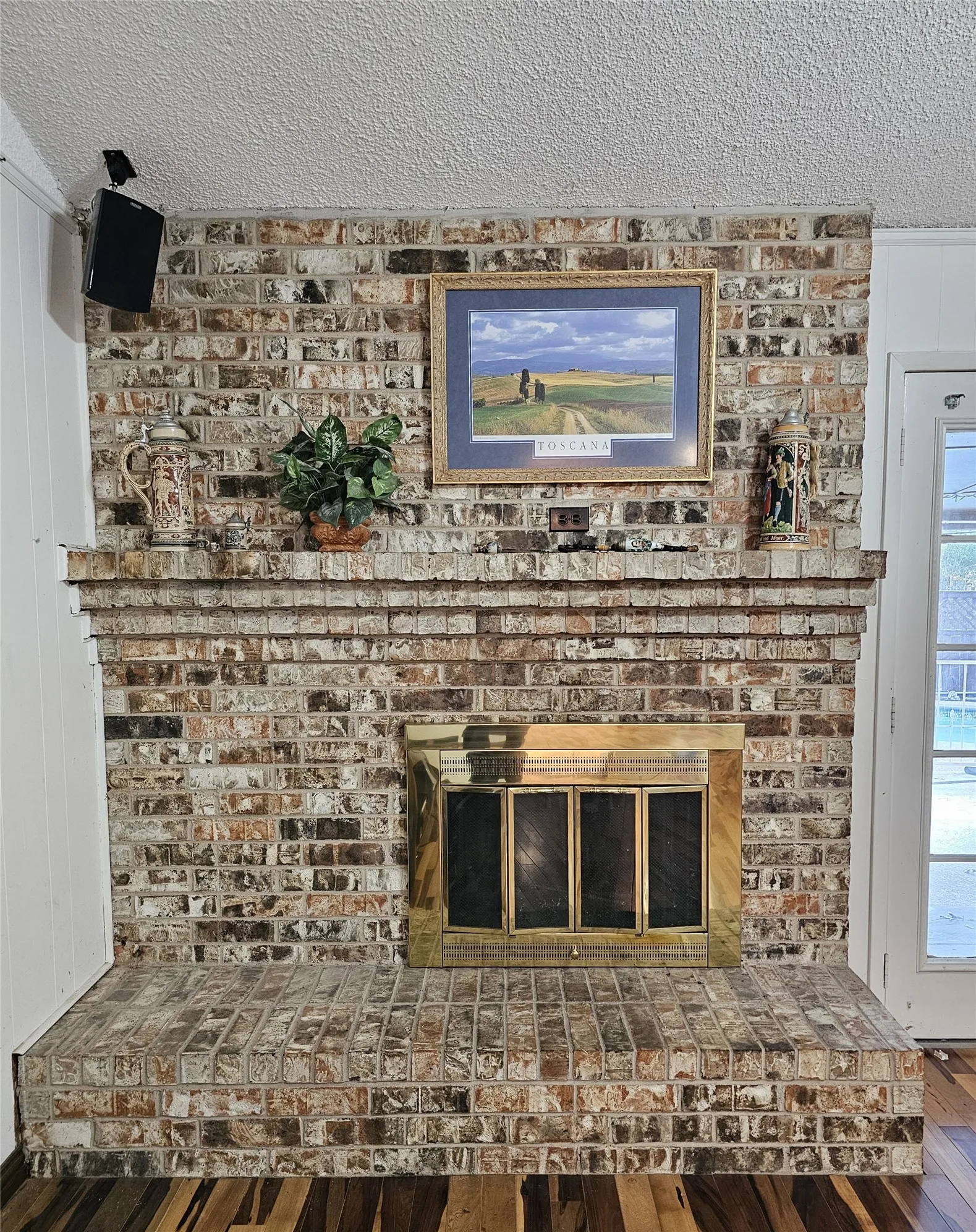 Huge brick, wood burning fireplace