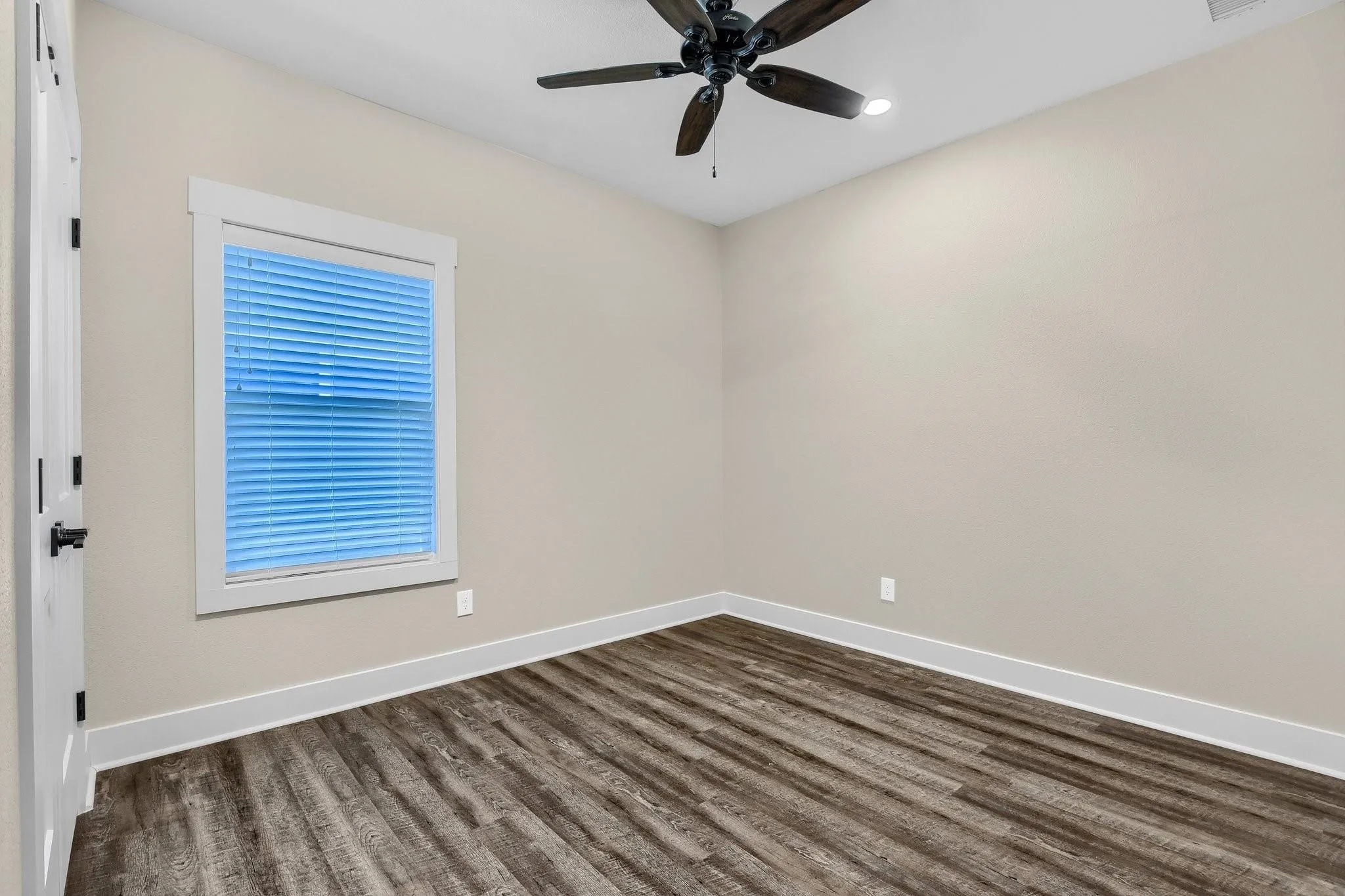 Wood-finish flooring with white trim