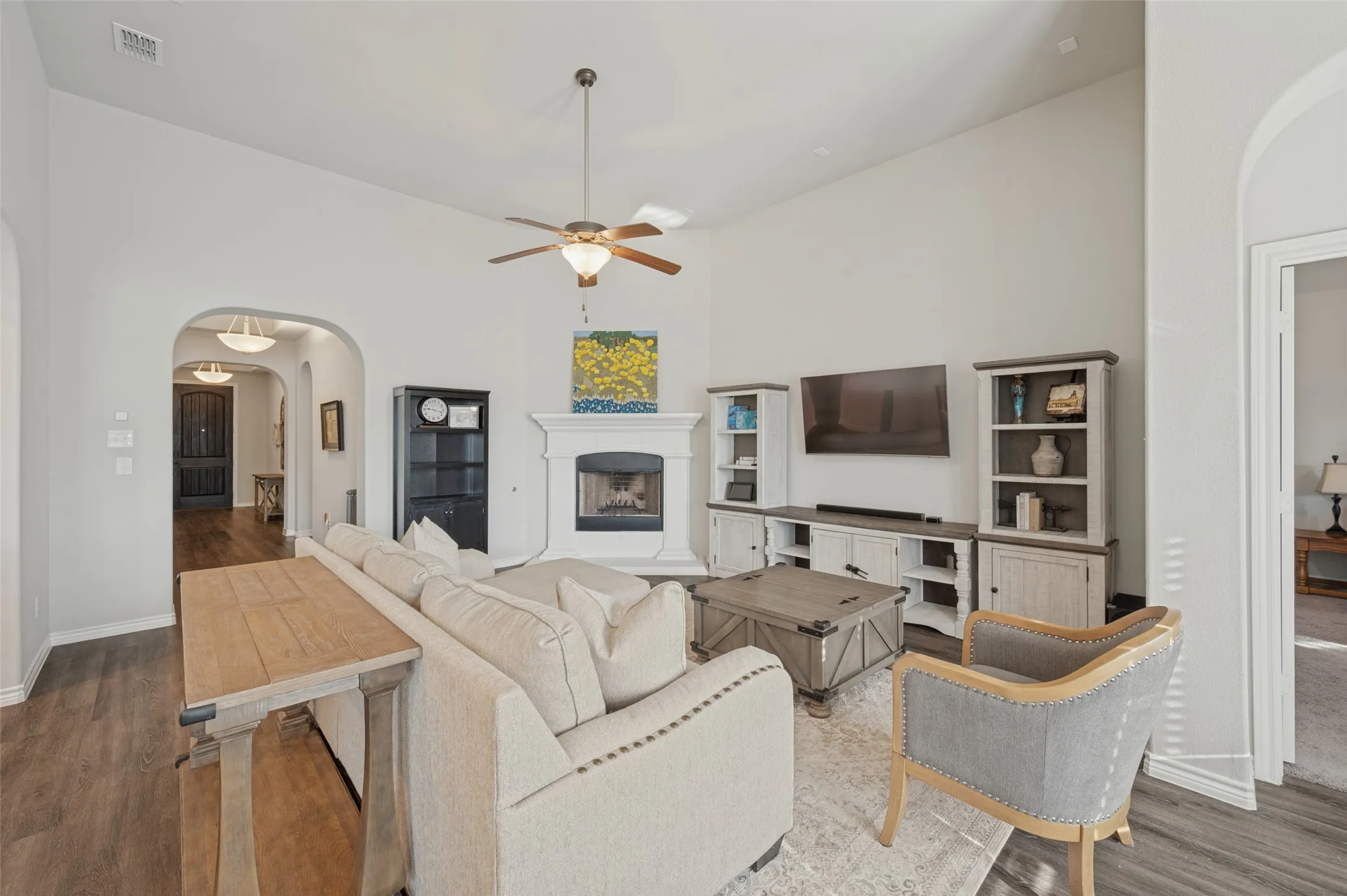 Living Room with vaulted ceiling and fan, Wood Burning Fireplace