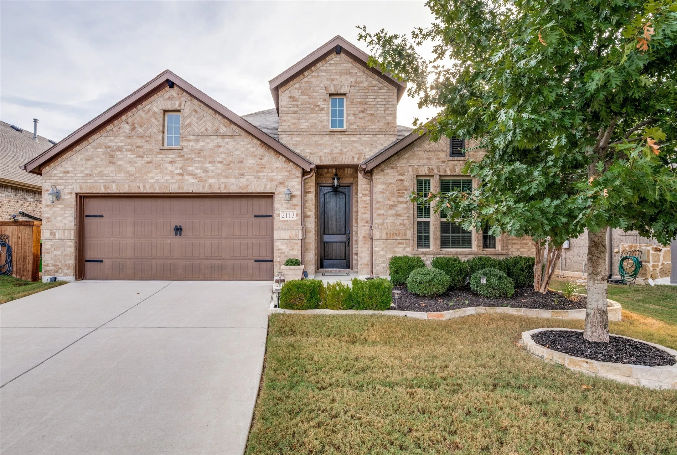 Nice Curb Appeal with Manicured Landscaping