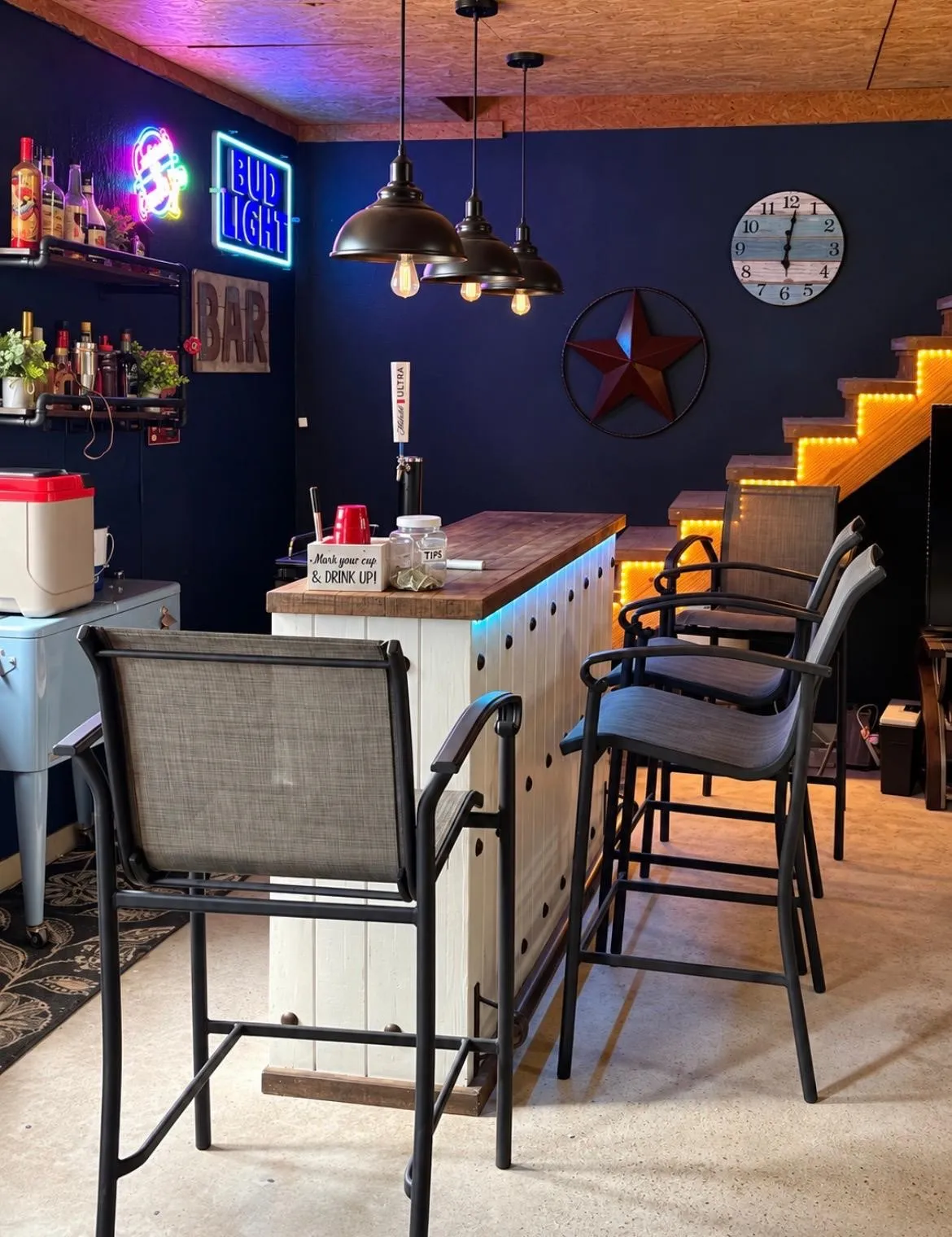 Custom bar area featuring a wood-finish countertop