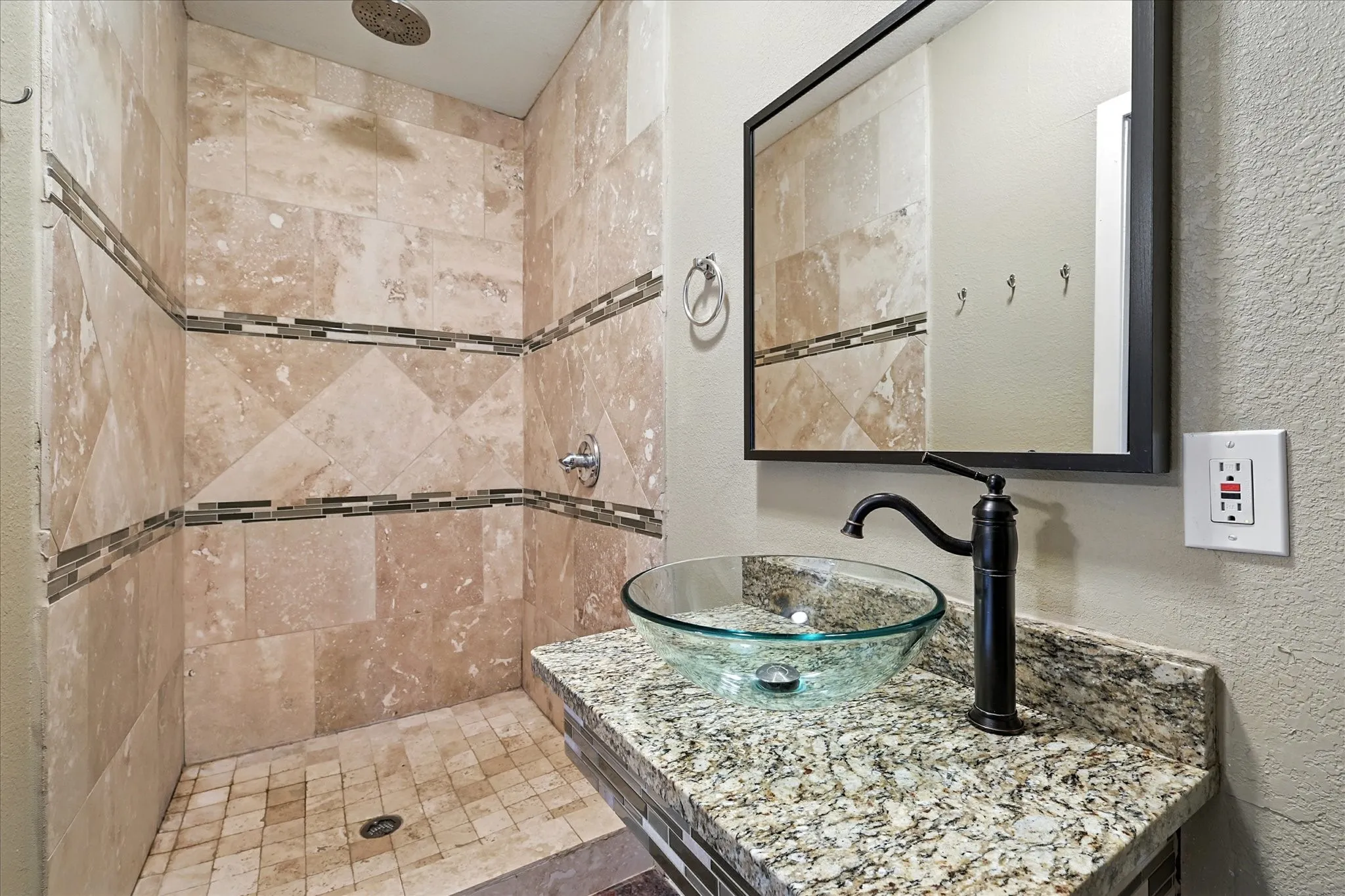 Primary ensuite bath, standup shower with granite vanity