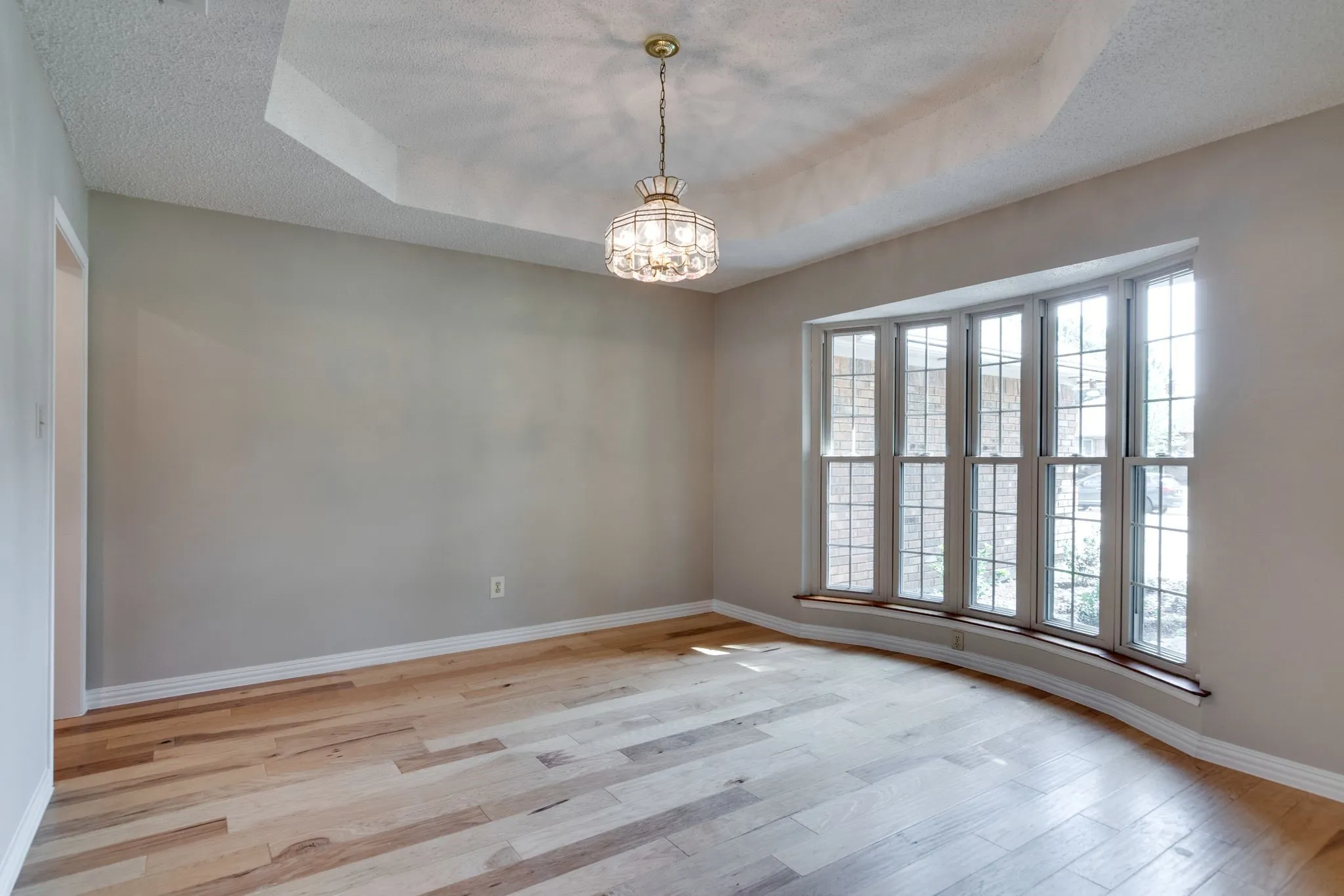 Plenty of room for large dining table to host dinner parties & wall space for hutch or buffet.