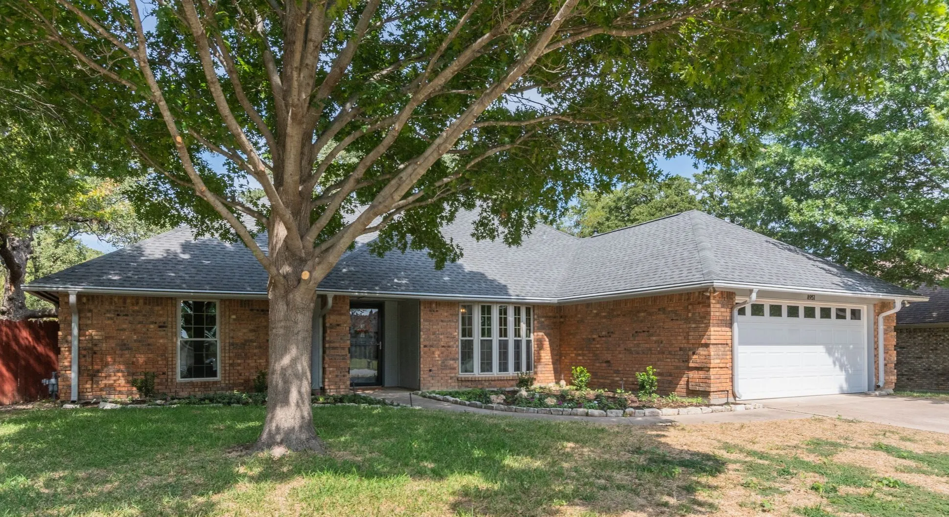 Fantastic home in North Richland Hills sits on pretty treed lot!