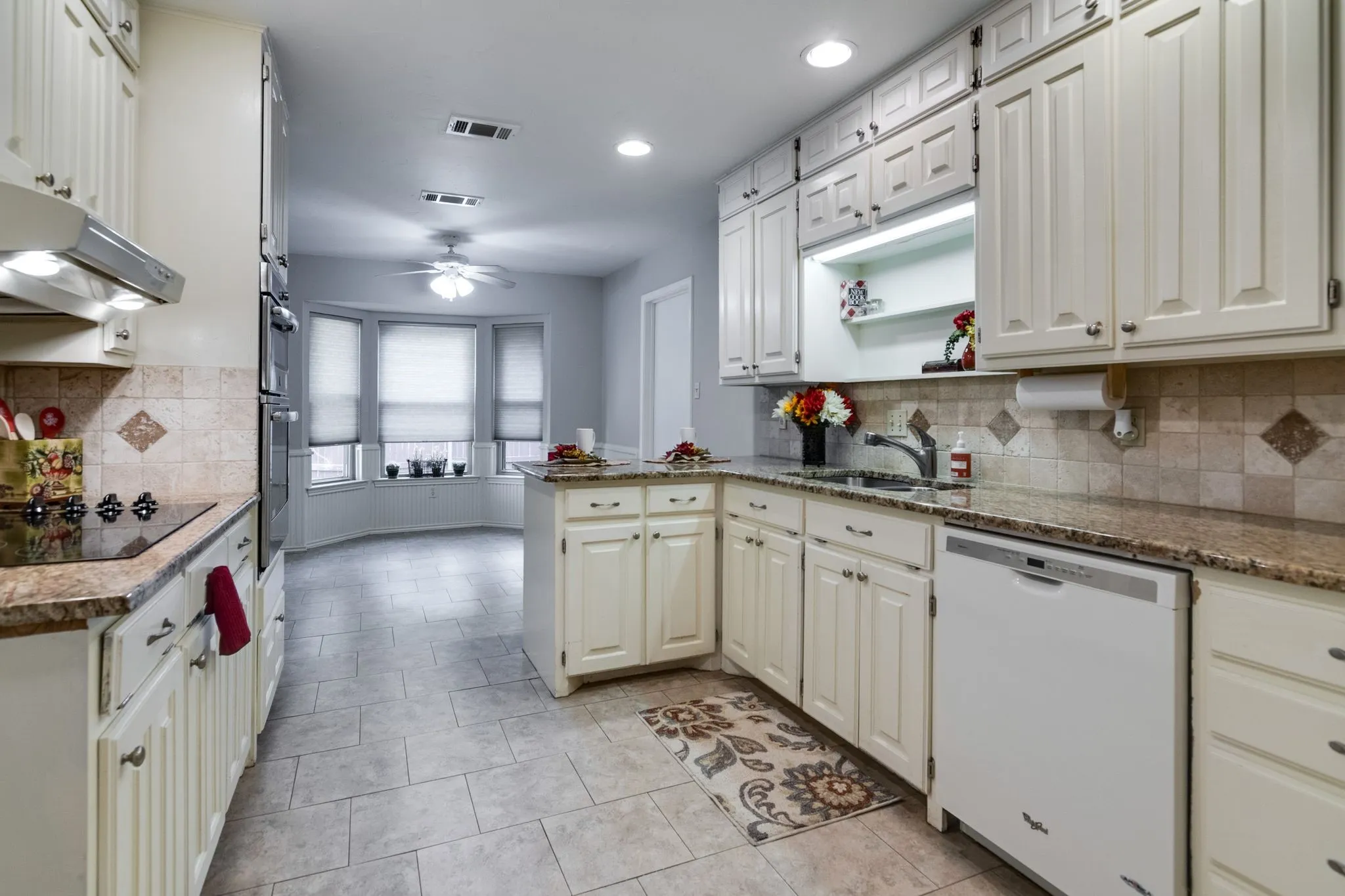 Did you notice the top upper cabinets?  Great place to store holiday dishes!