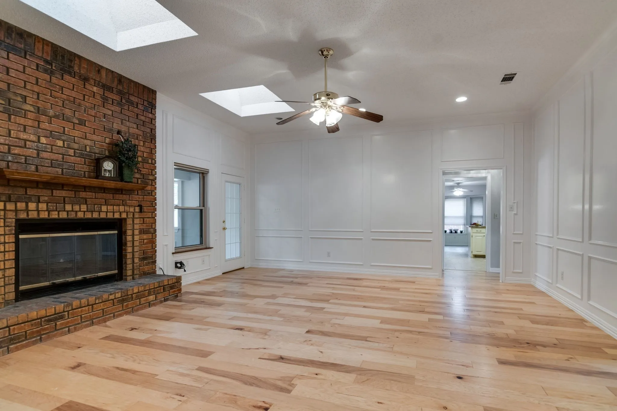 Fireplace has gas starter & gas logs.  Skylights provides lots of natural lighting!