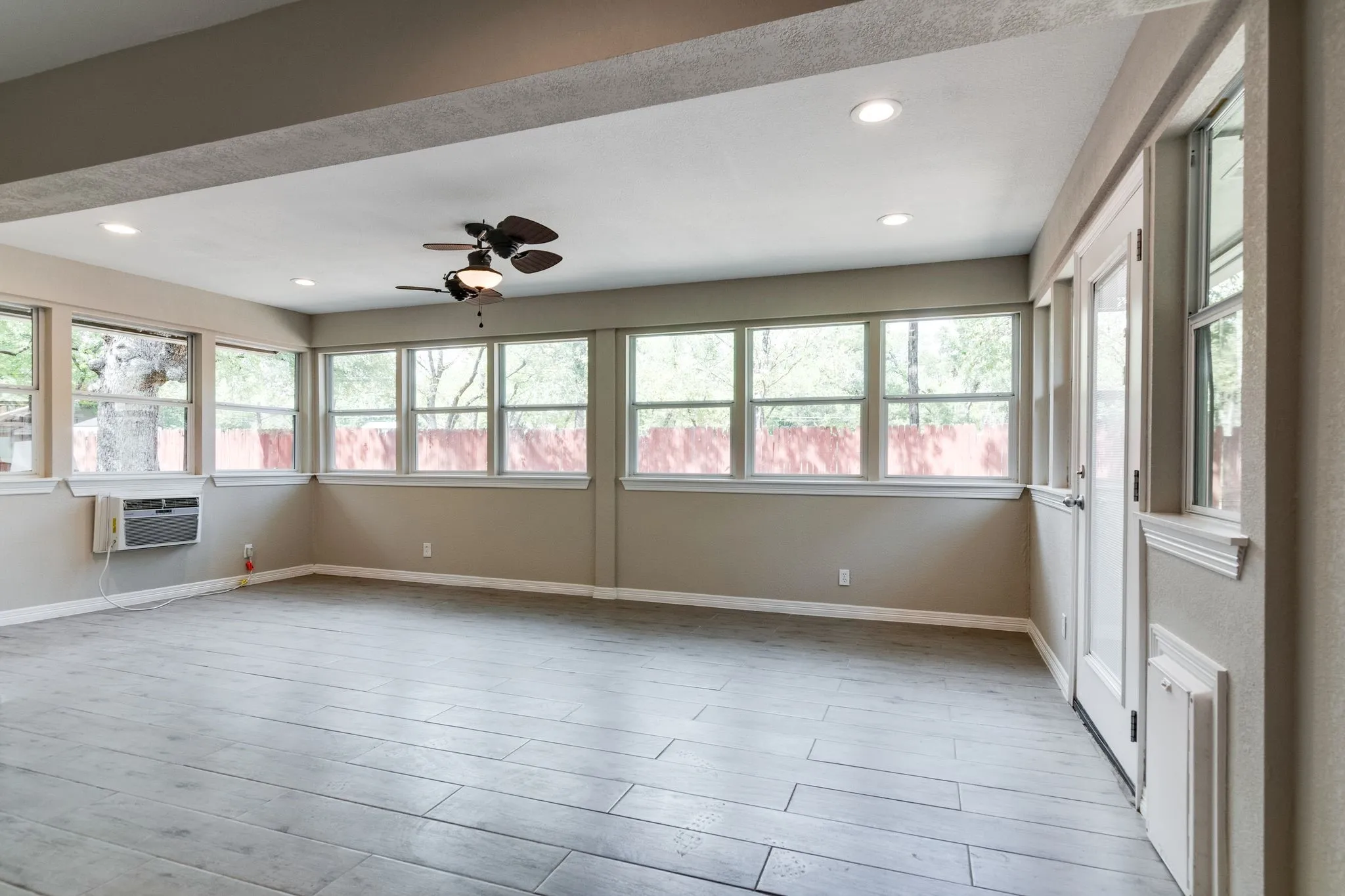 How would you utilize this 271 additional square feet of living space?  Beautiful walls of windows brings the outdoors inside but with AC!